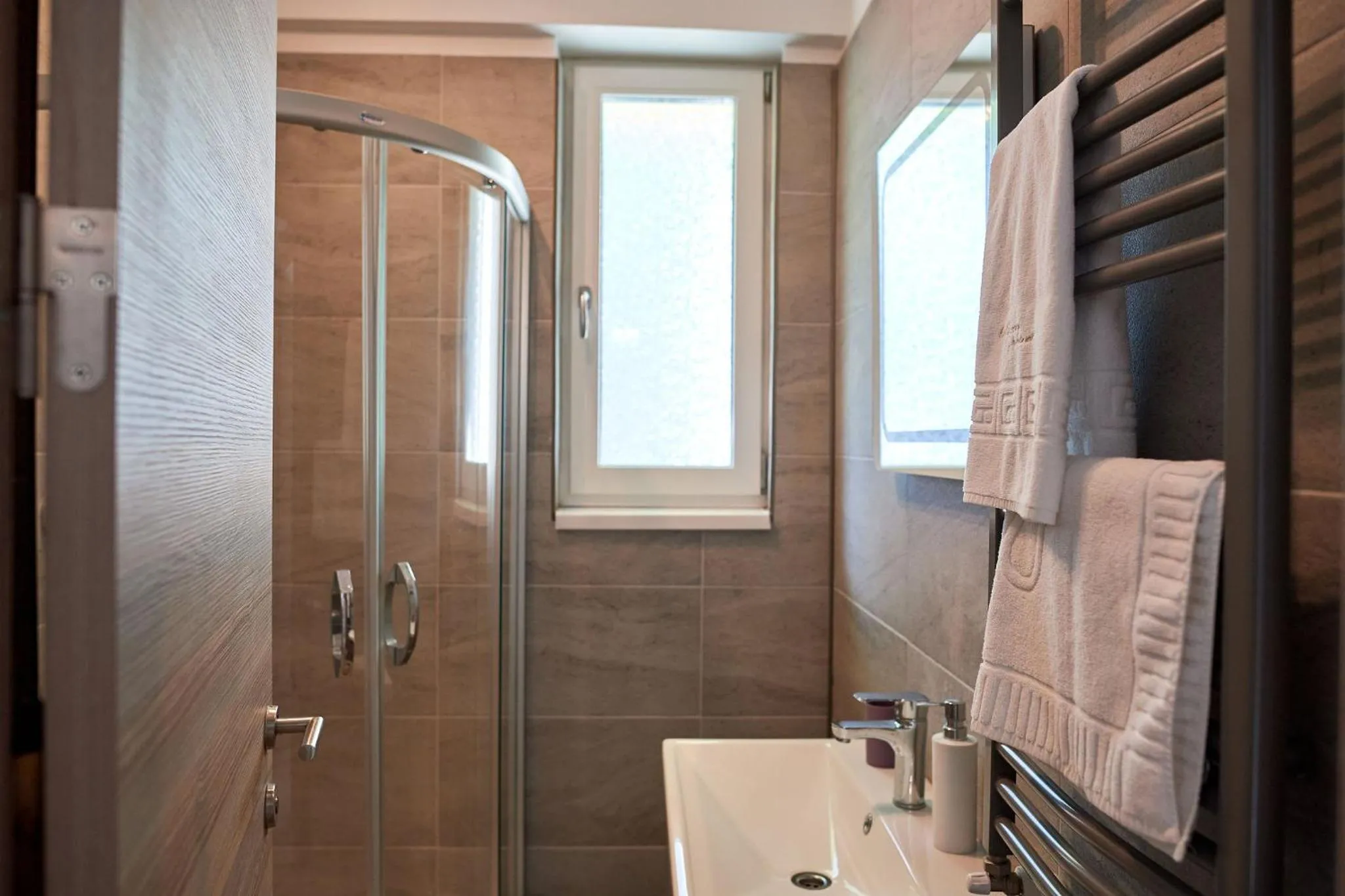 Bathroom in Glamour Sea view Family Apartments - Spa n Pools Resort