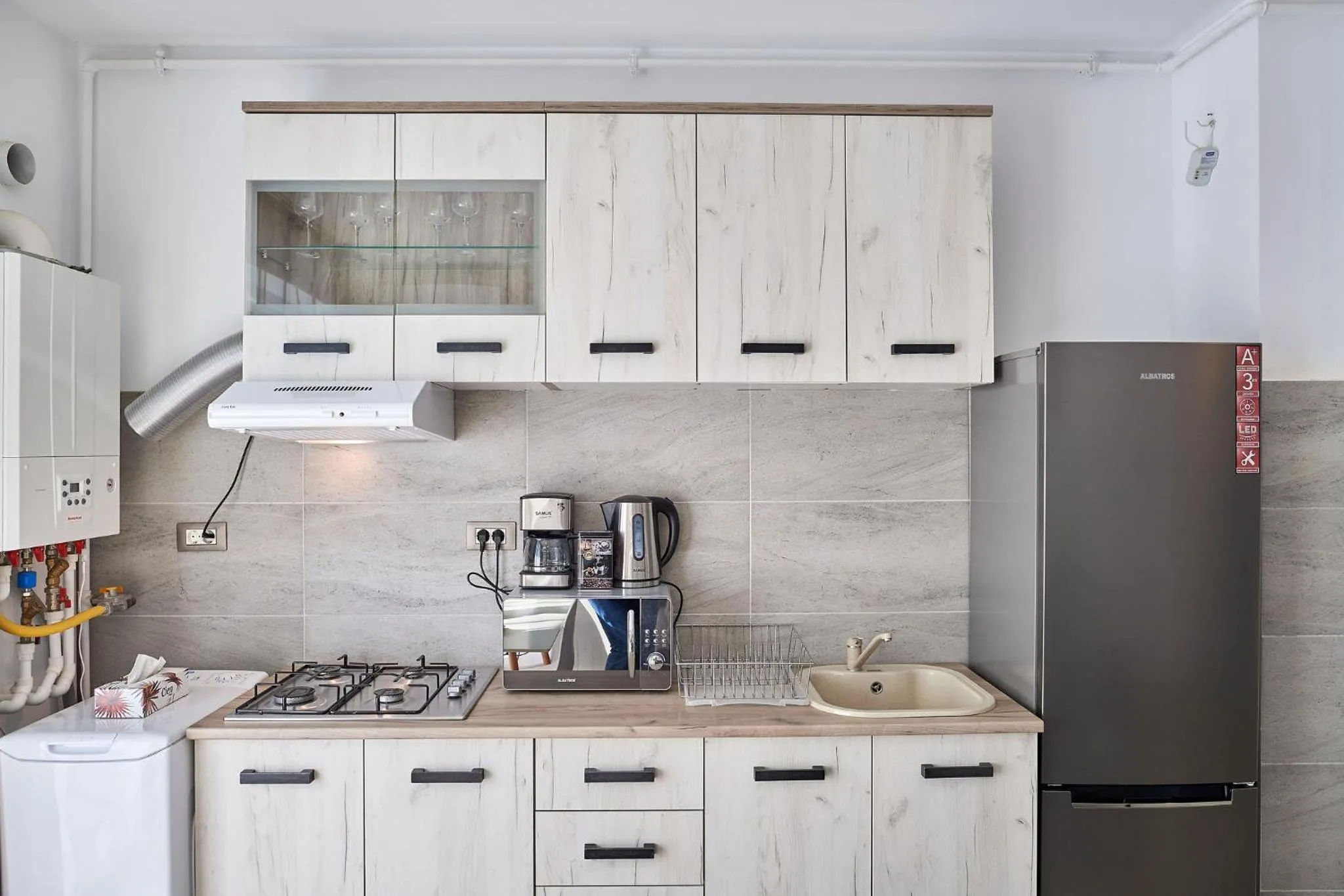 Kitchen or kitchenette in Glamour Sea view Family Apartments - Spa n Pools Resort