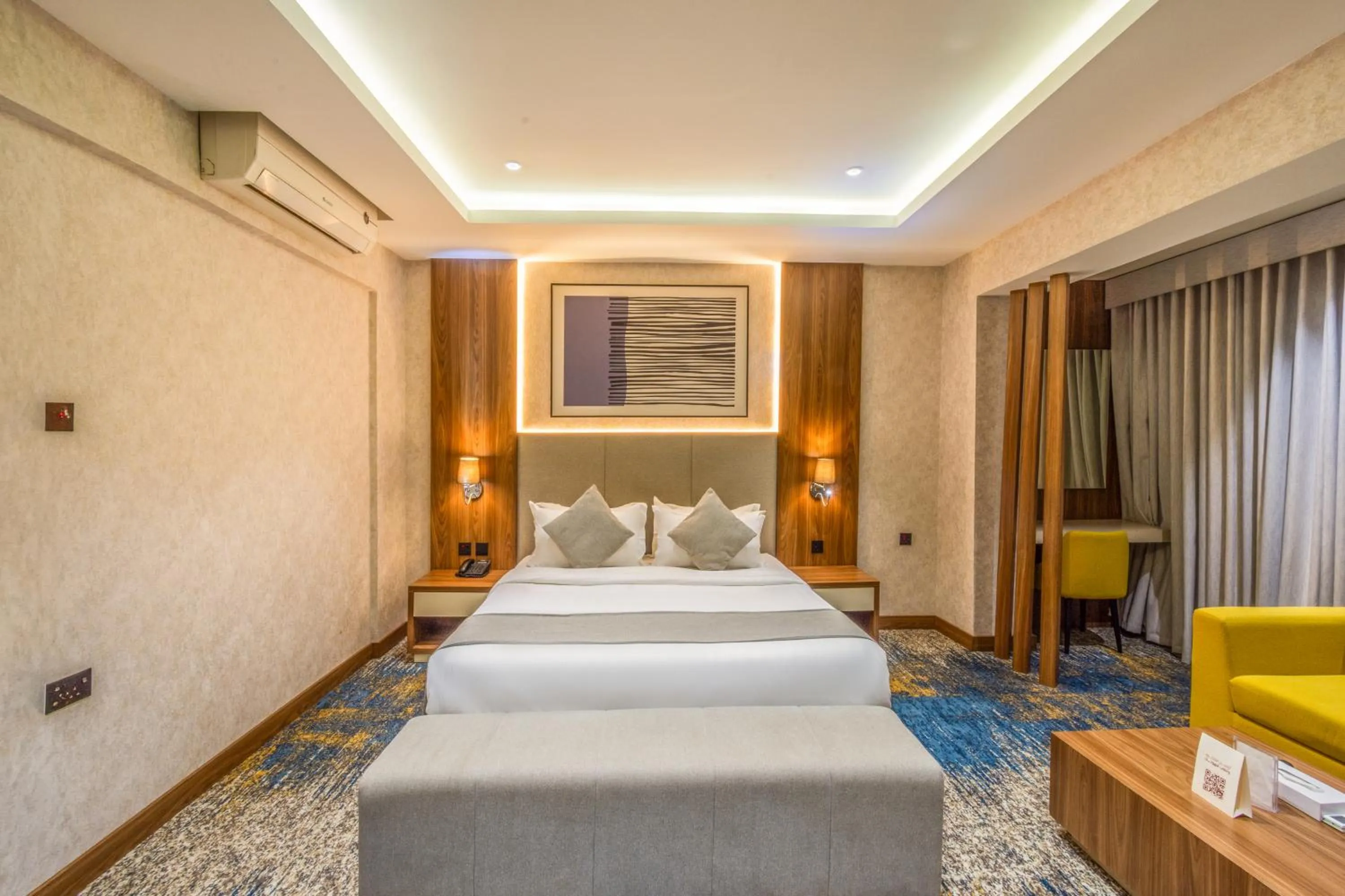 Bed in Almsakn Alola Hotel Company