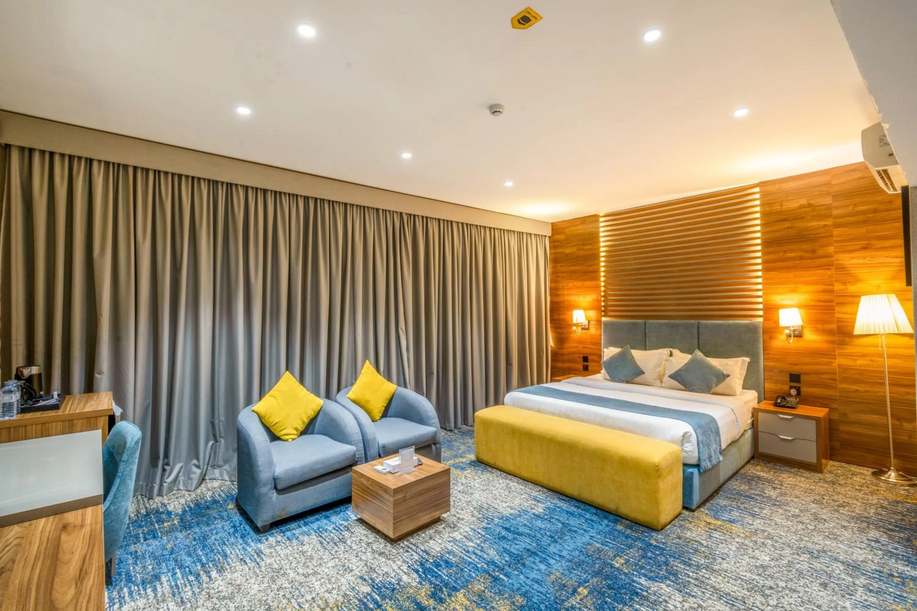 Bed in Almsakn Alola Hotel Company