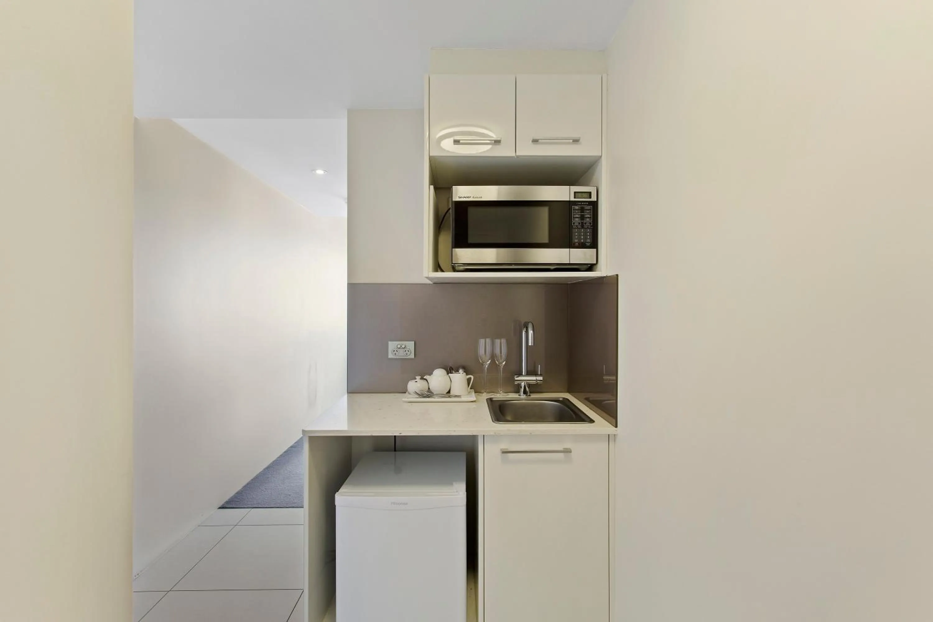 Kitchen or kitchenette in CBD Executive Apartments