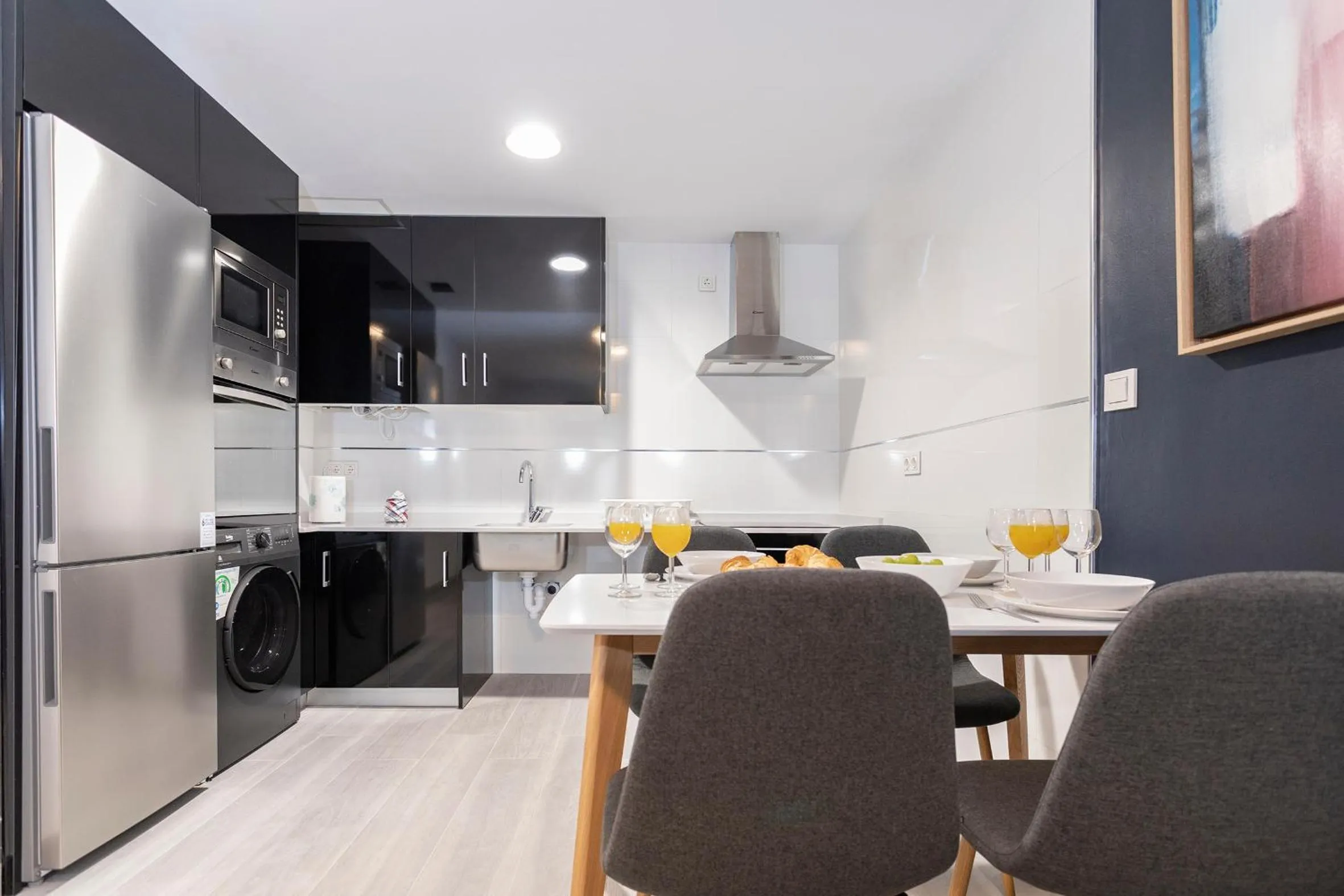Kitchen or kitchenette in Málaga Rivas 34 Suites Homes