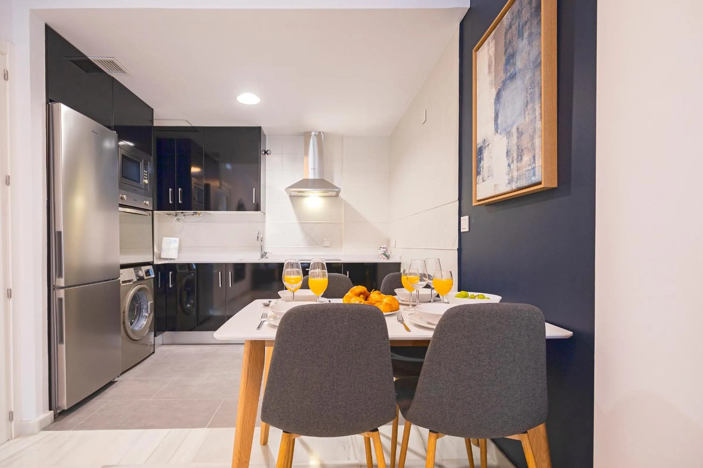 Kitchen or kitchenette in Málaga Rivas 34 Suites Homes