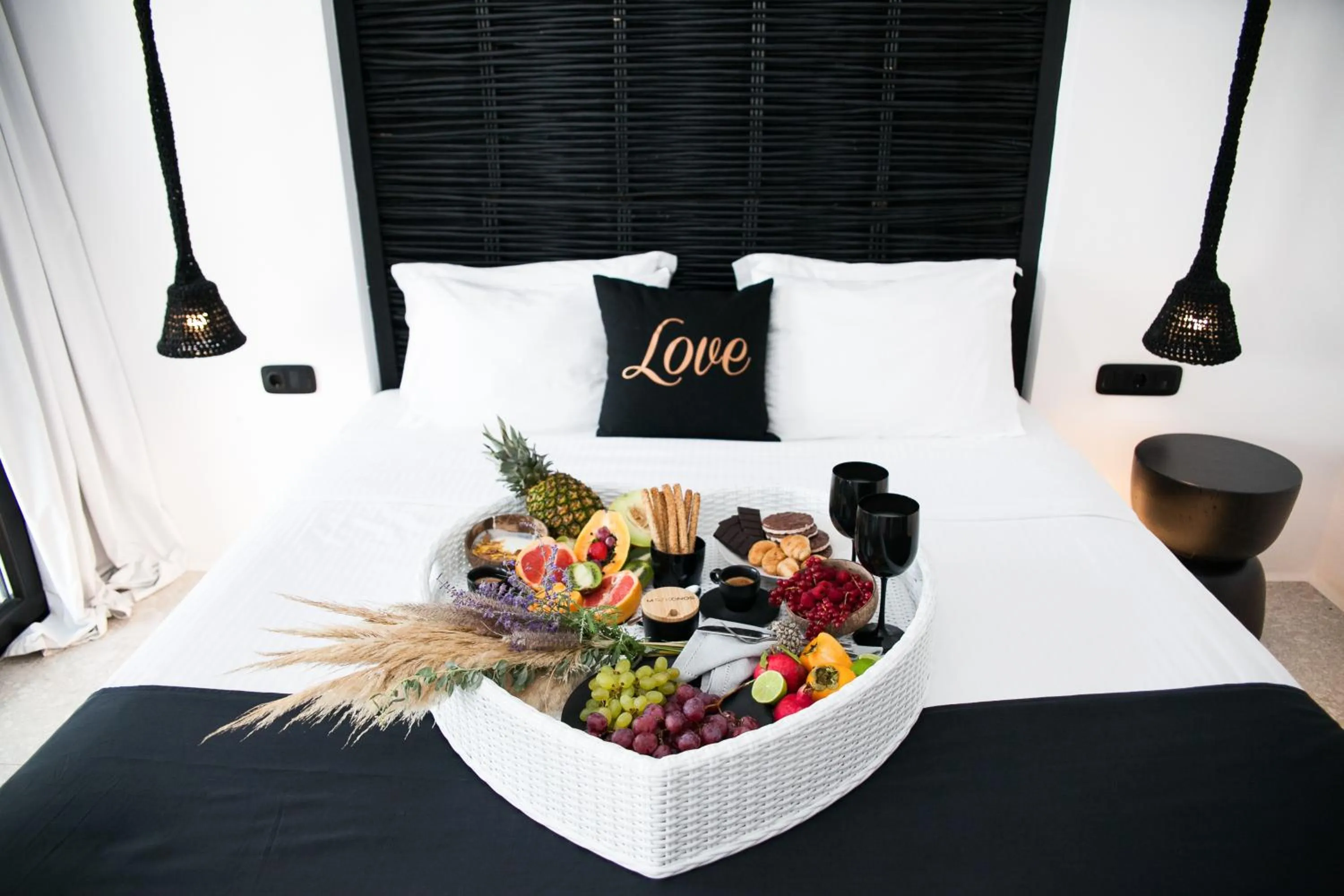 Bed in Agrari Bo Suites by Mykonos Rocks