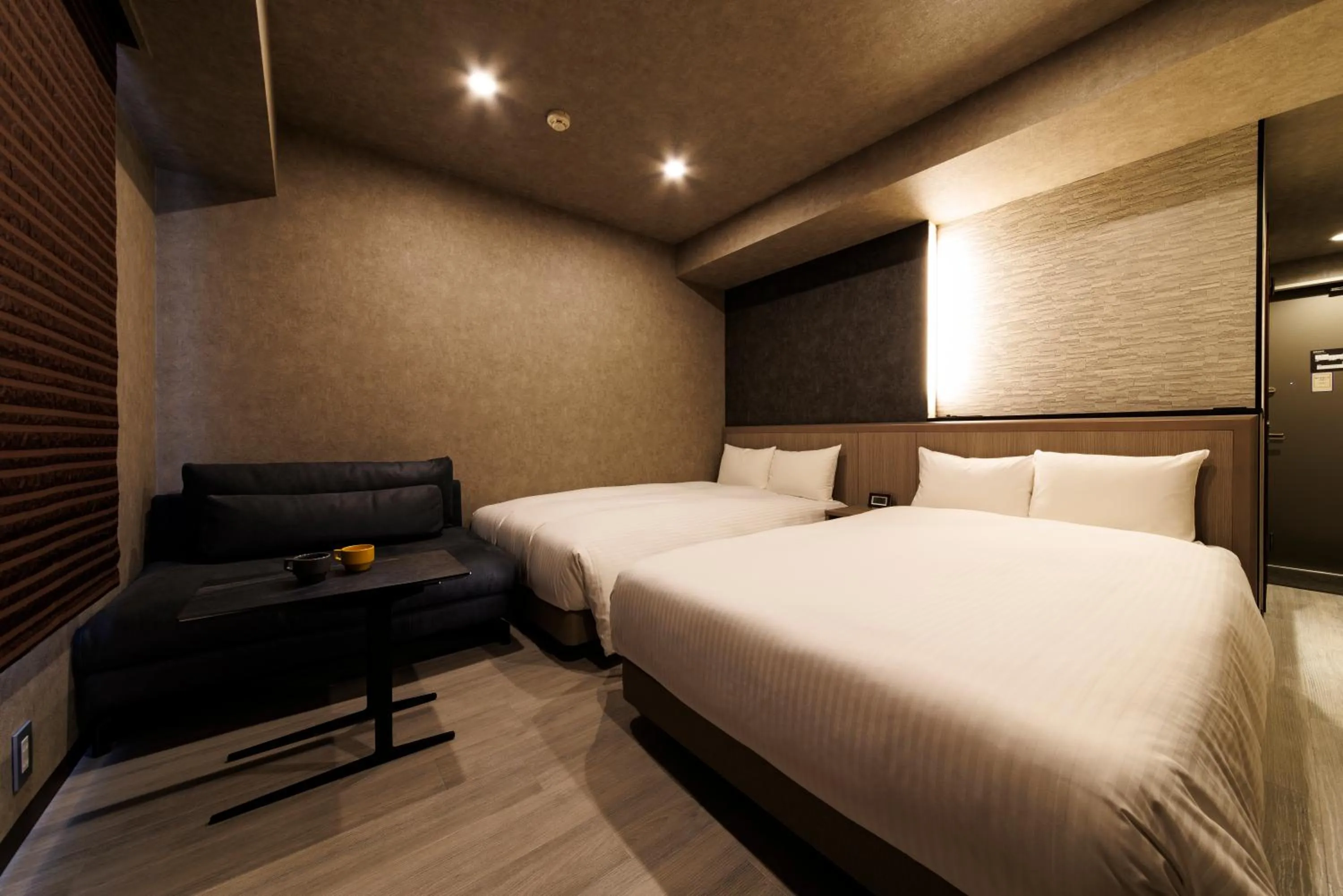 Bed in Hotel Hakata Place