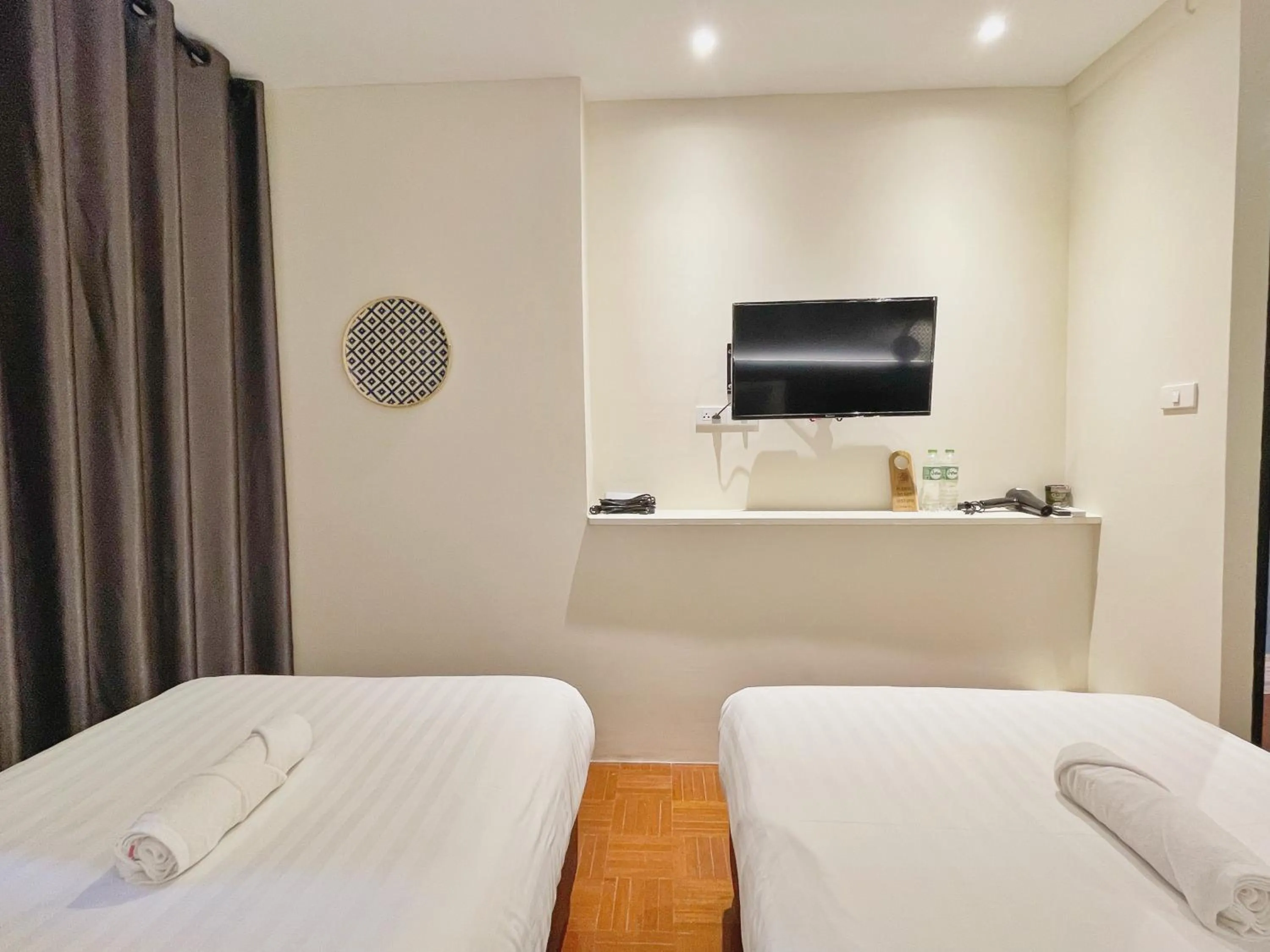 Bed in Sabaiday Guesthouse Nimman