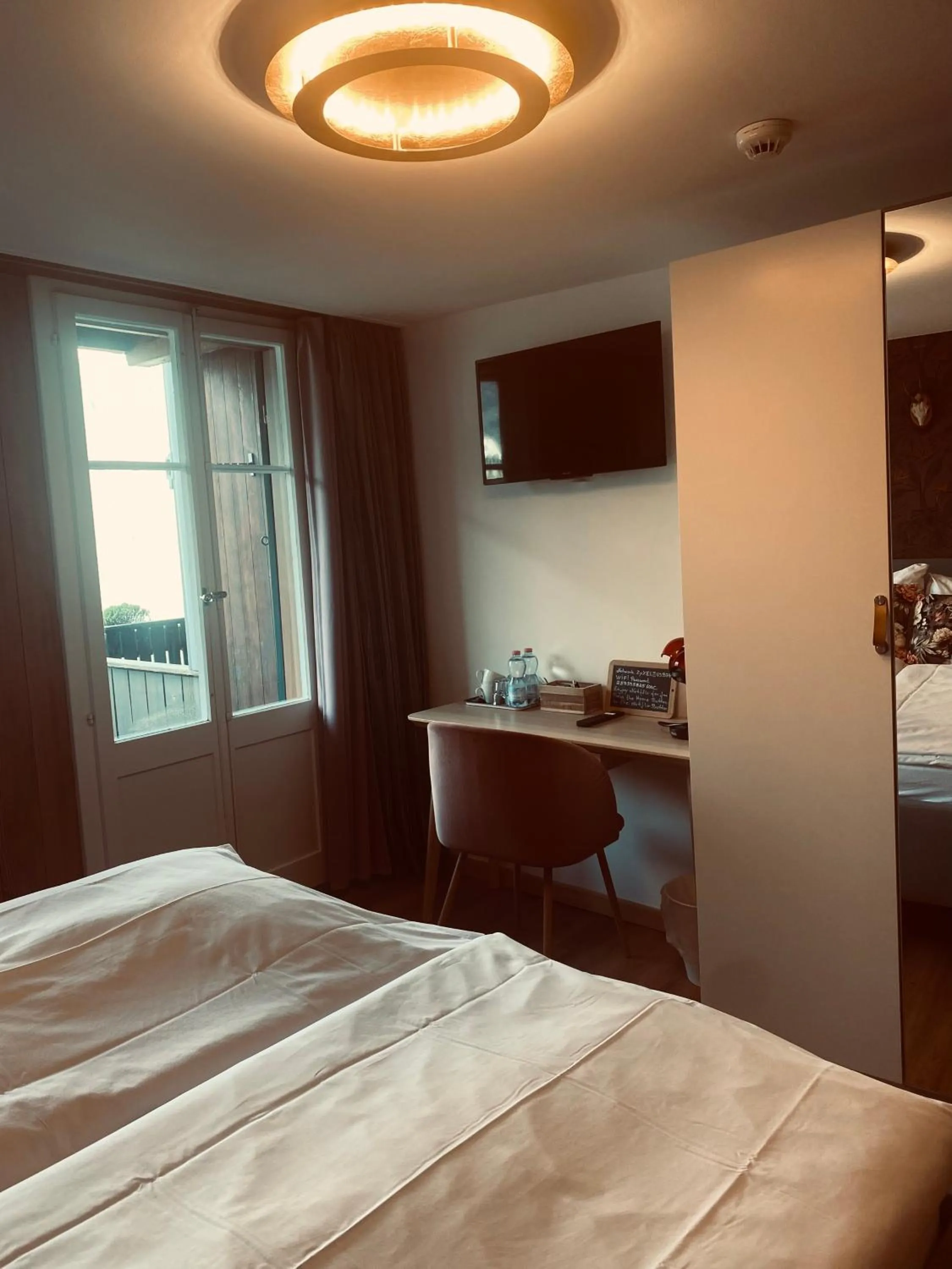 Bed in Boutique Hotel Bellevue B&B am Brienzersee Iseltwald Interlaken