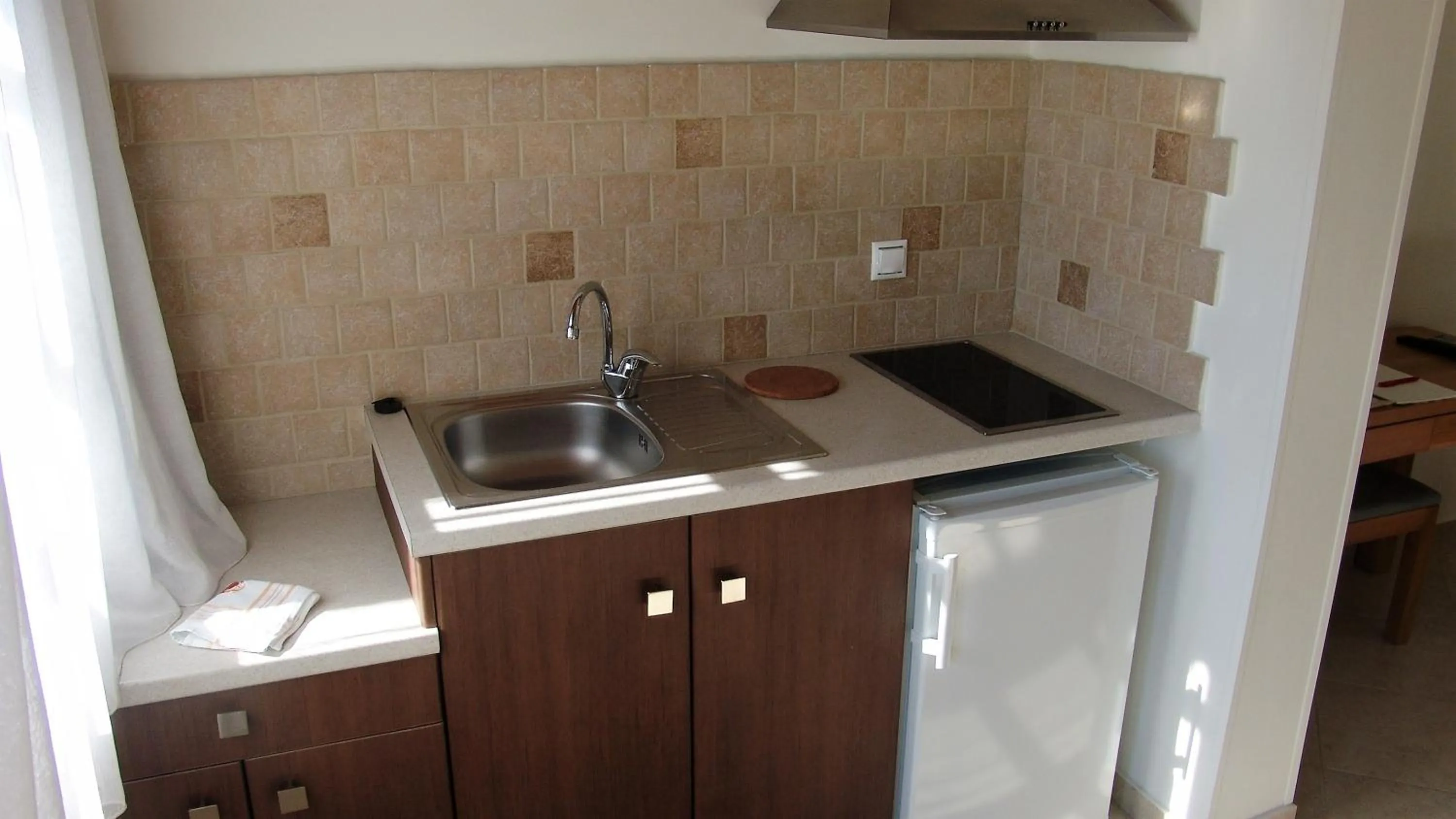 Kitchen or kitchenette in Notis Hotel