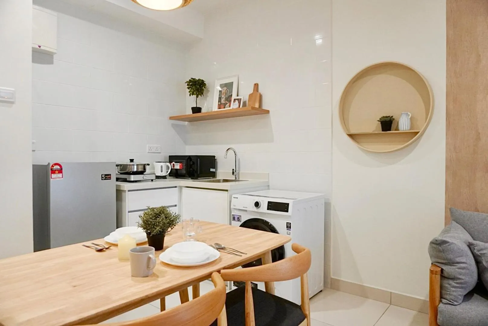 Kitchen or kitchenette in Arte Mont Kiara by CozyNest