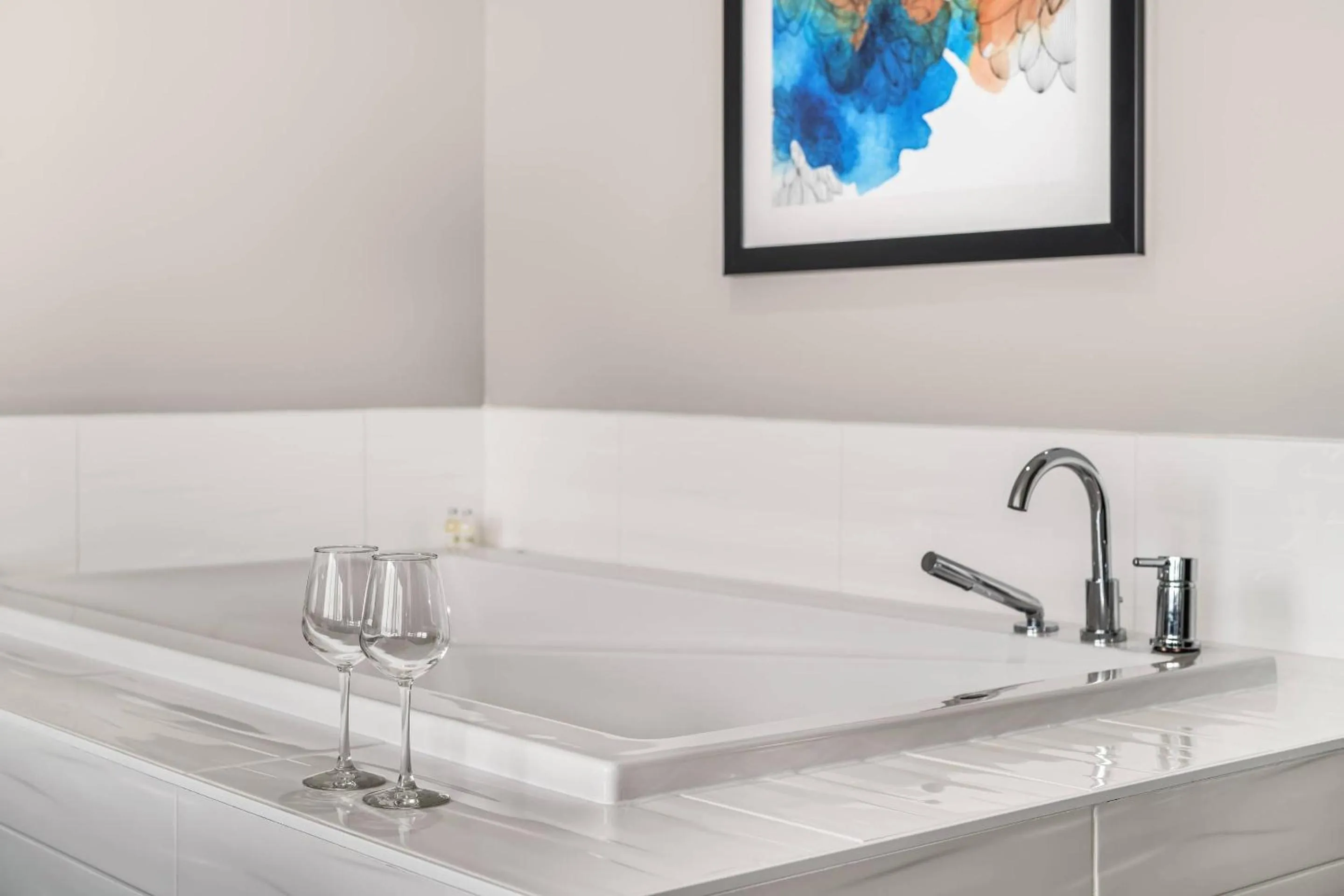 Bedroom in Amsterdam Inn & Suites, an Ascend Collection Hotel