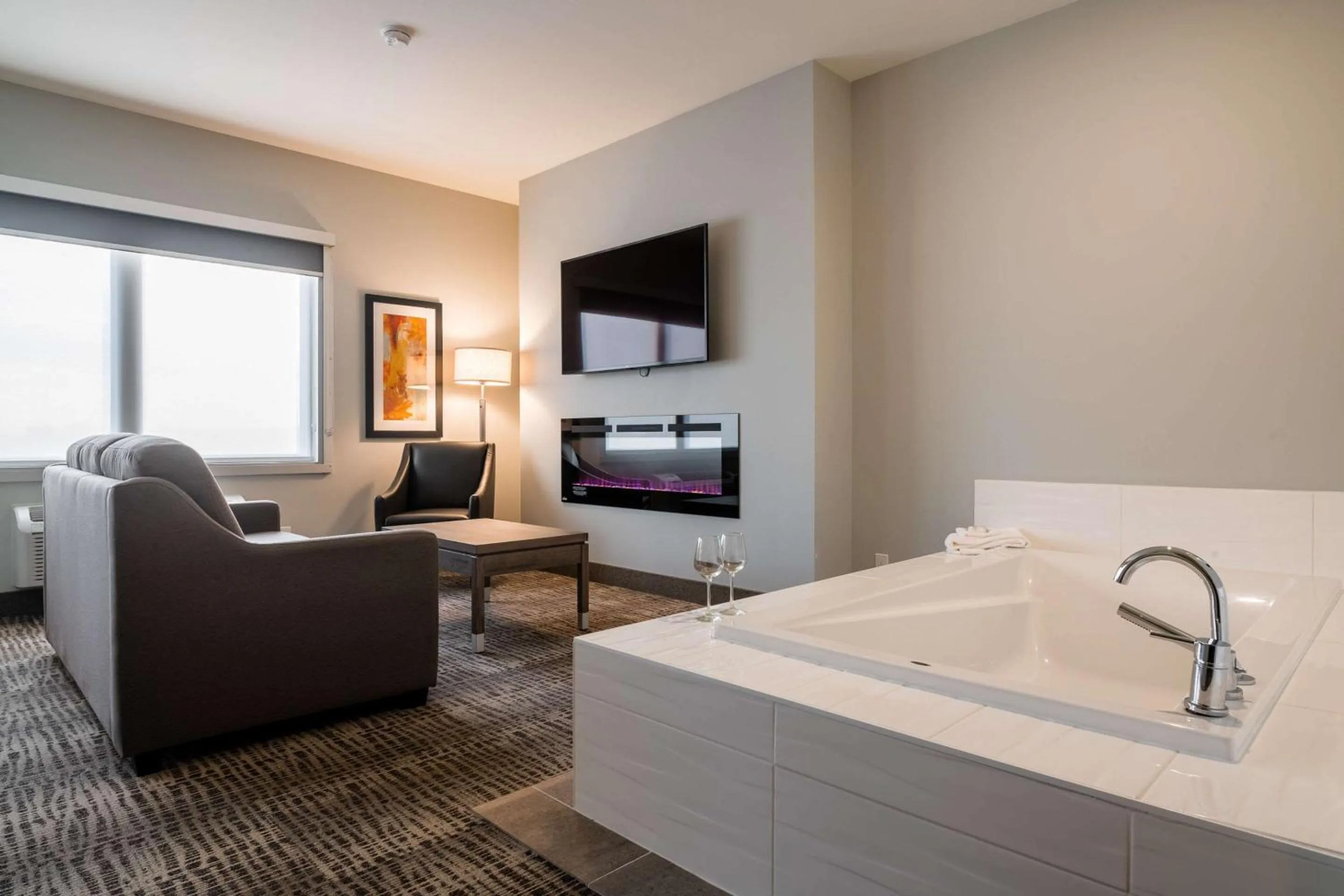 Bedroom, Bed in Amsterdam Inn & Suites, an Ascend Collection Hotel