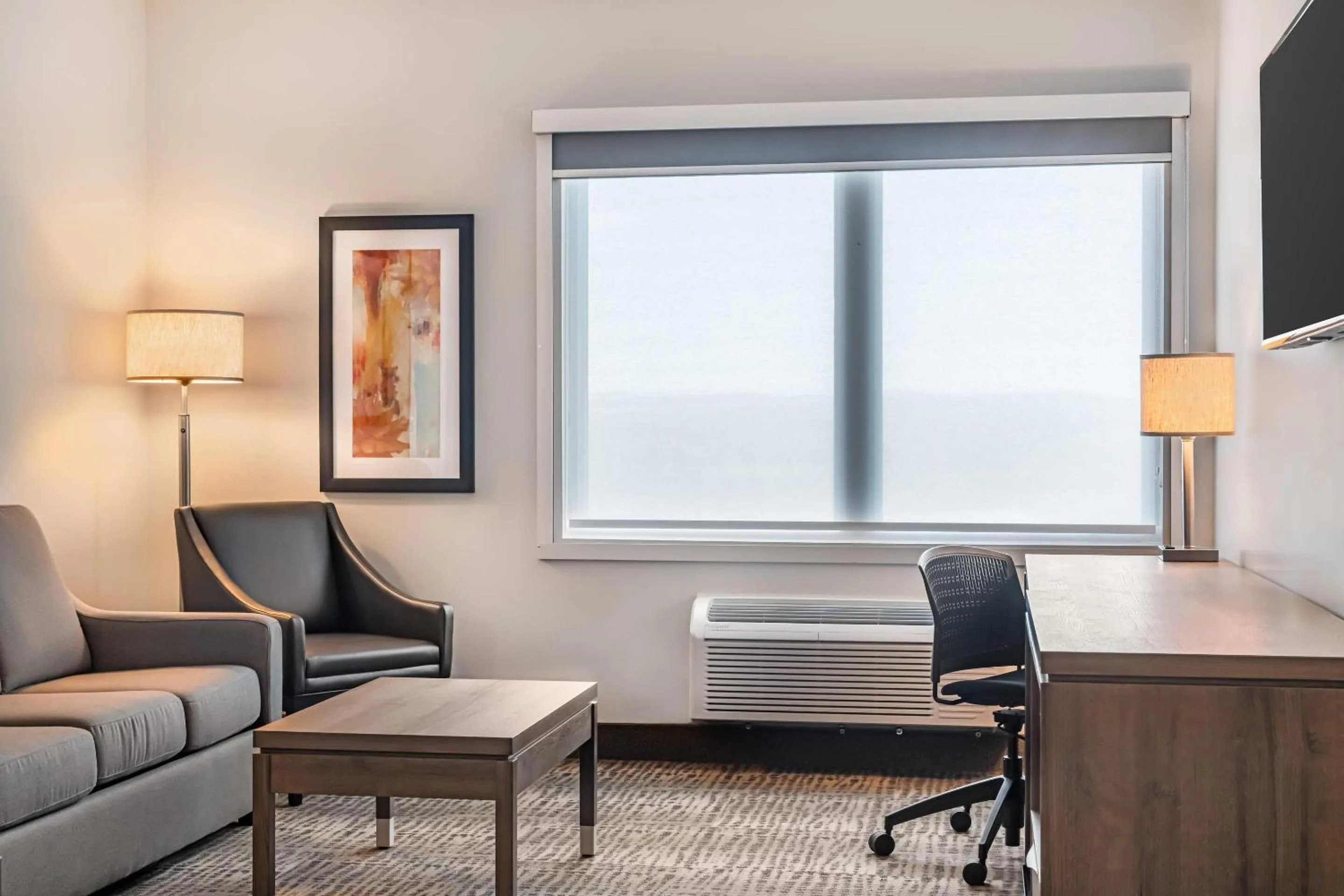 Bedroom in Amsterdam Inn & Suites, an Ascend Collection Hotel