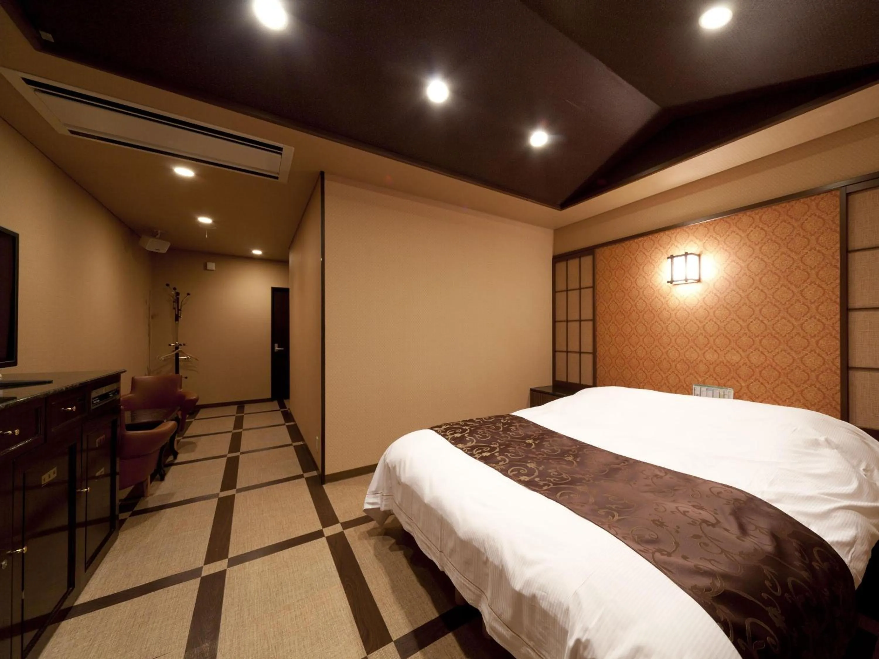 Photo of the whole room, Bed in Hotel Fine Garden Matsuzaka III