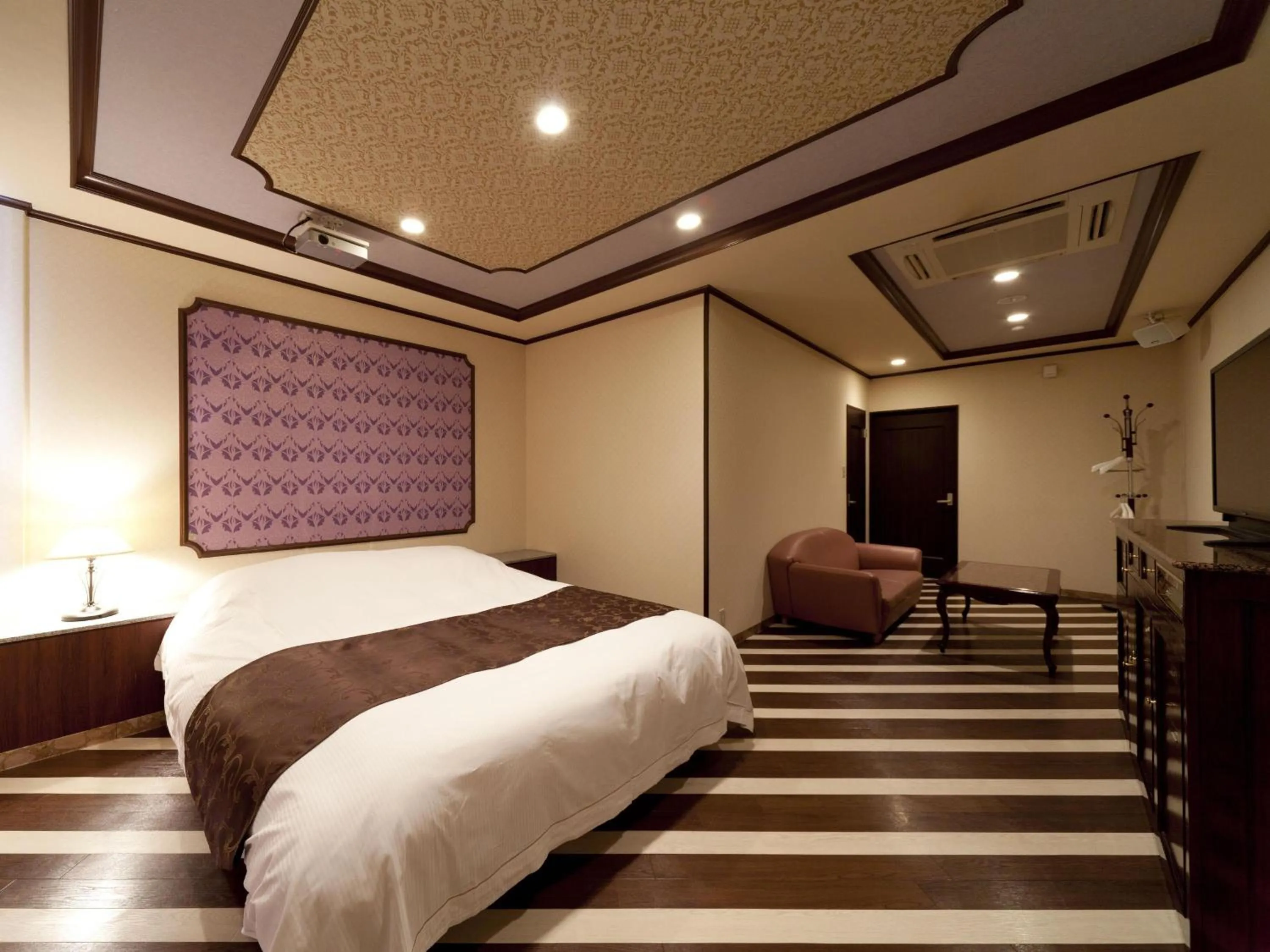 Photo of the whole room, Bed in Hotel Fine Garden Matsuzaka III