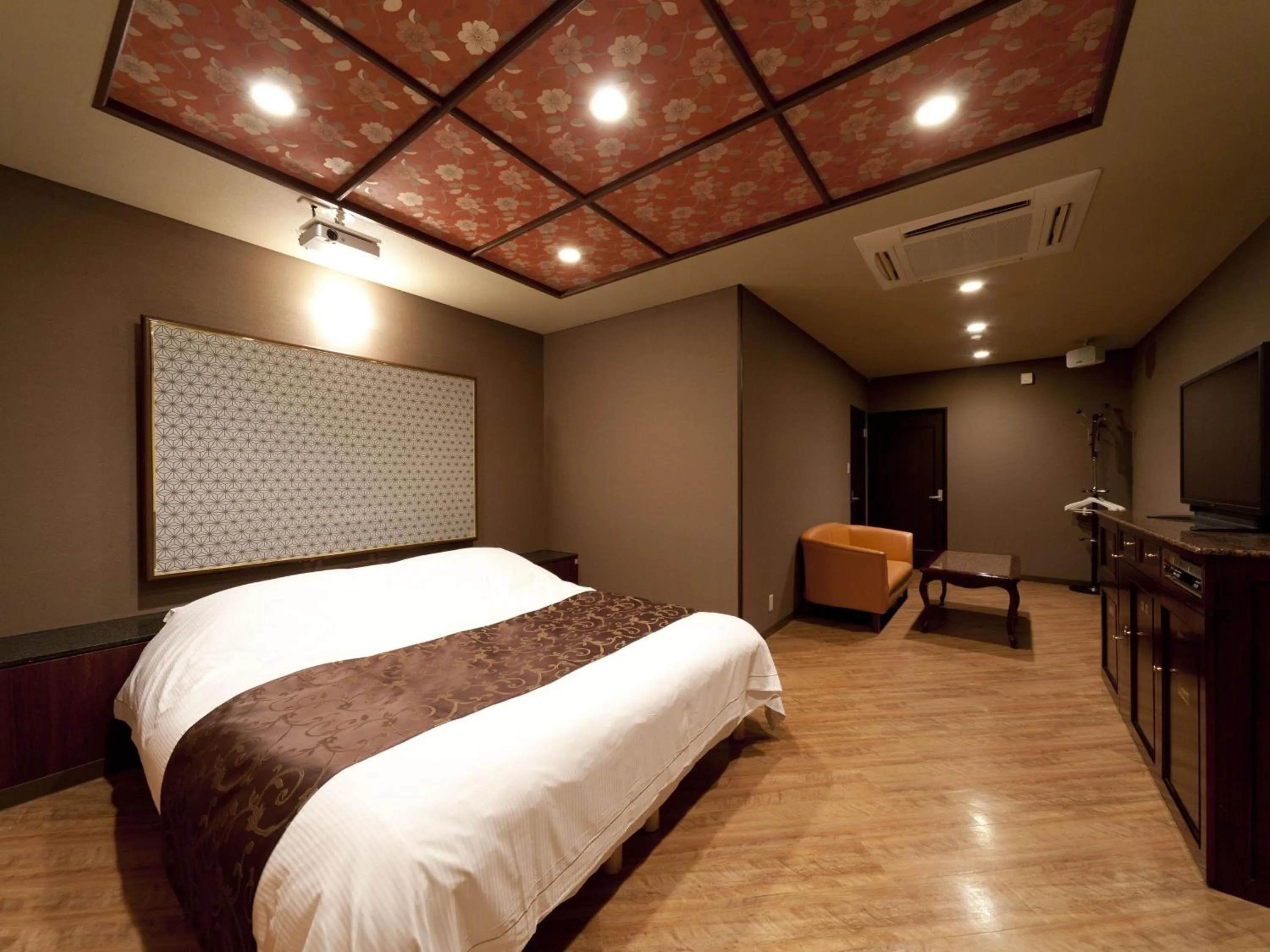 Photo of the whole room, Bed in Hotel Fine Garden Matsuzaka III