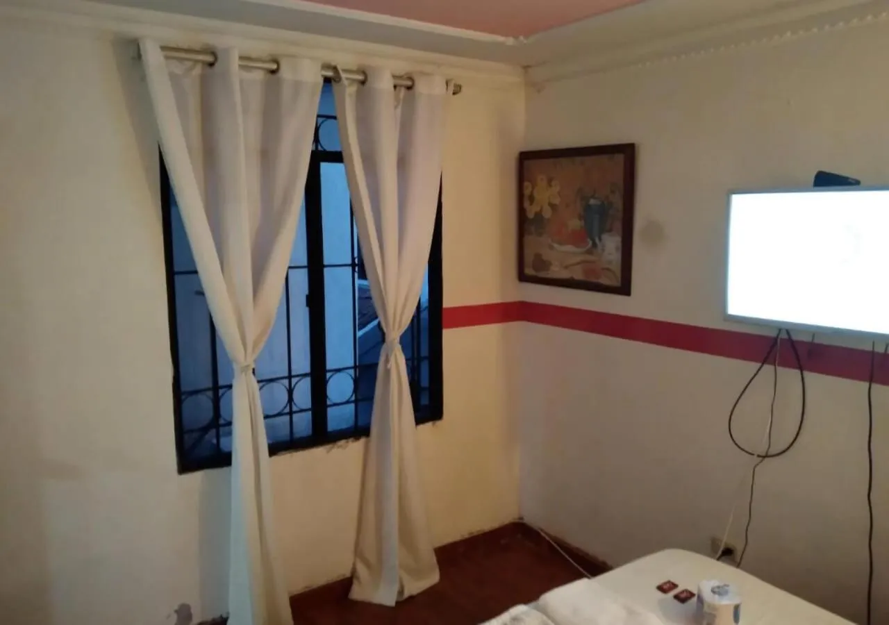 Bedroom in Casa hotel Mi Huila