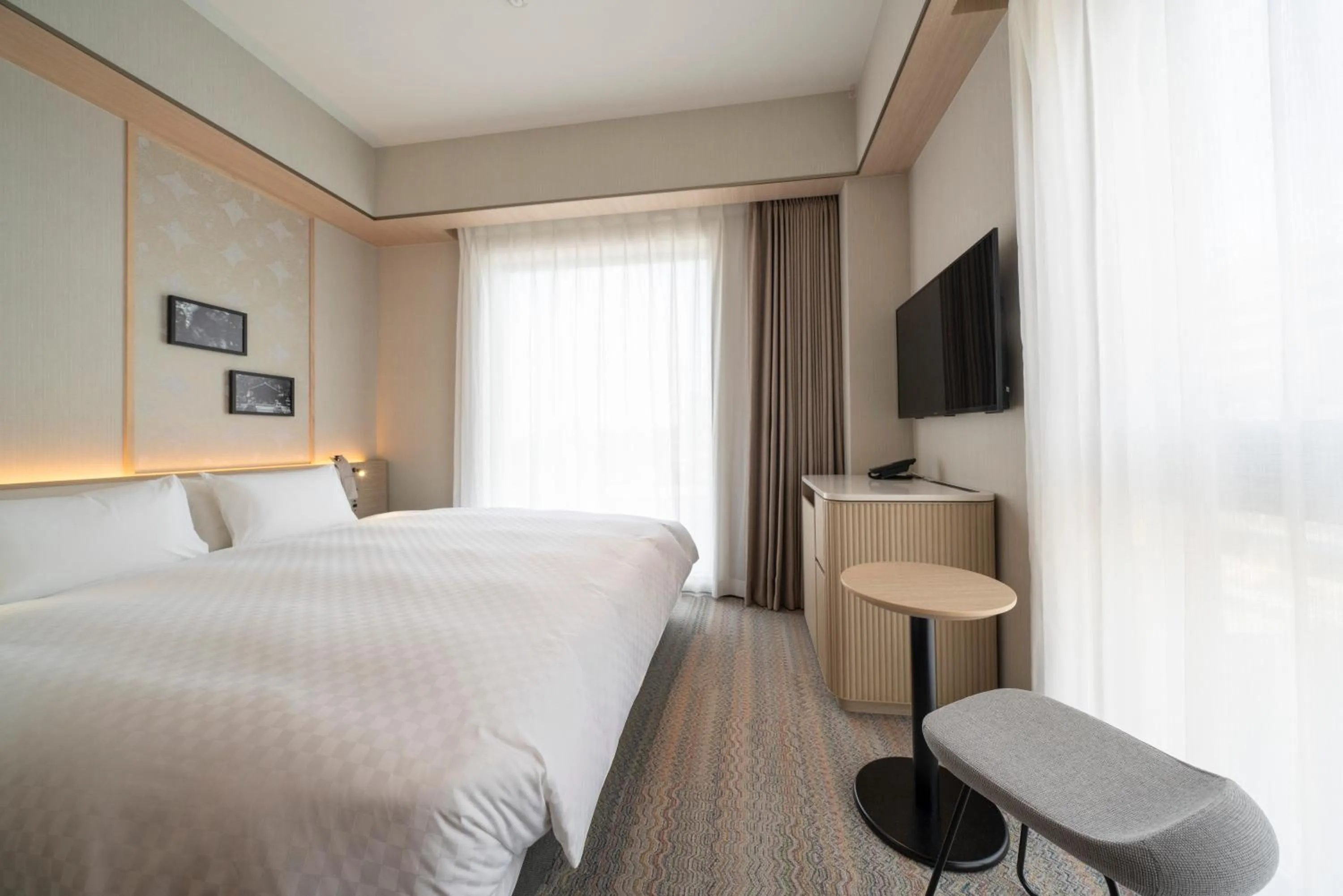 Photo of the whole room, Bed in HOTEL μ STYLE INUYAMA experience