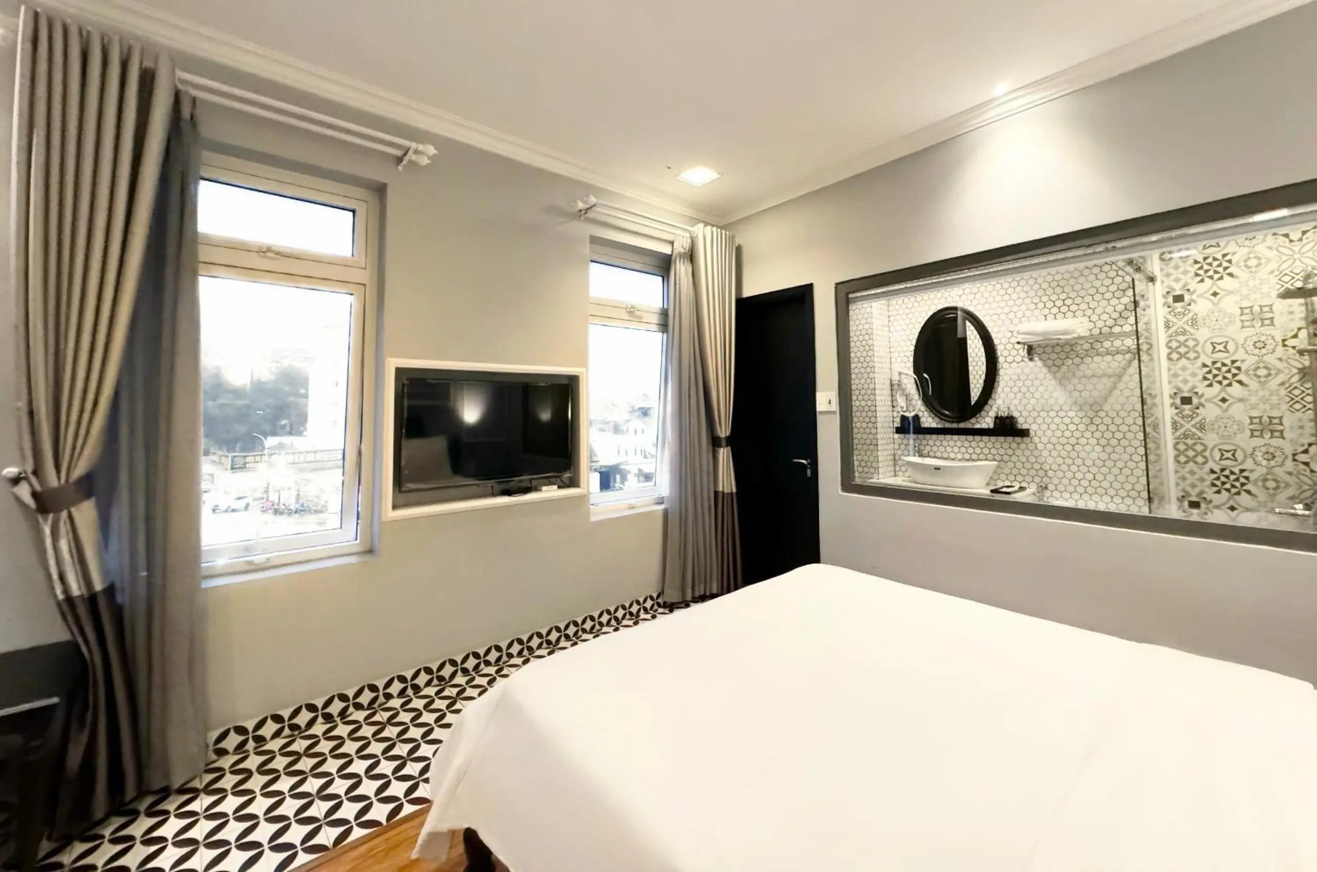 Bed in TTR Skypool View Hotel