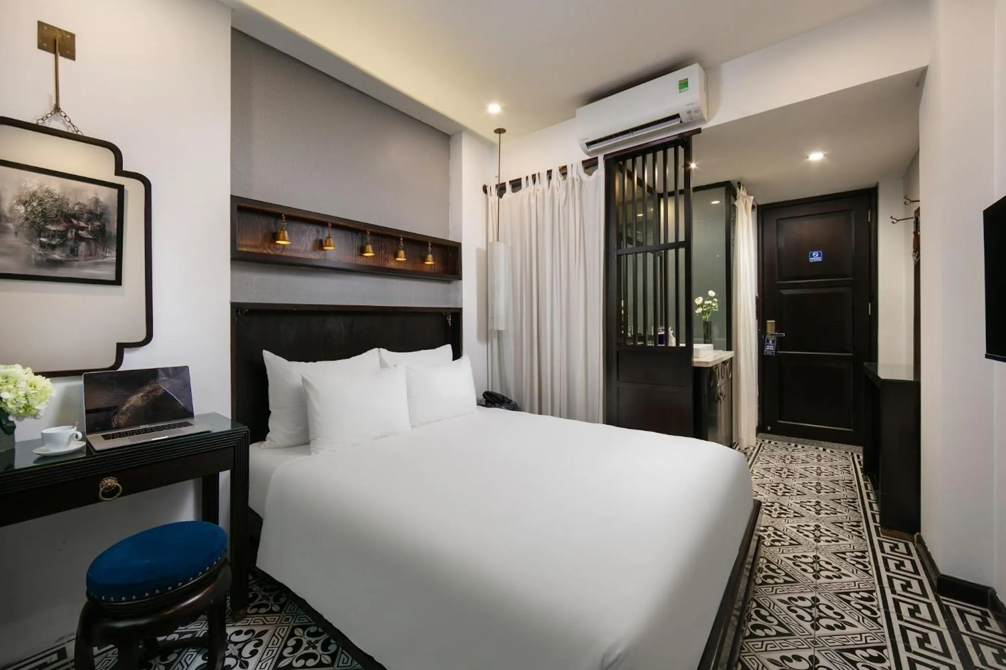 Bed in Carillon Boutique Hotel