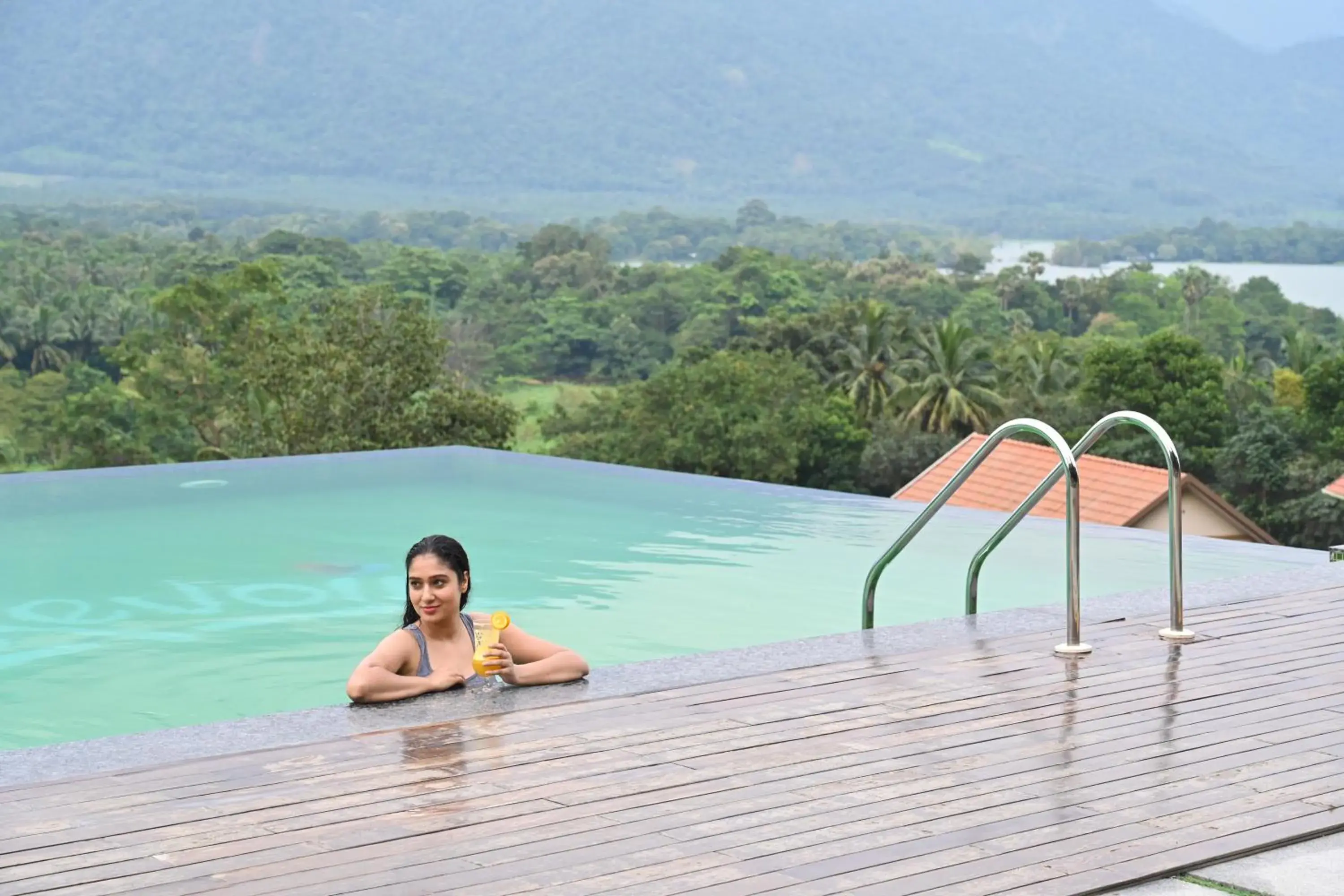 Swimming pool in Au Revoir Wellness Resort, Malampuzha Swimming pool in Au Revoir Wellness Resort, Malampuzha
