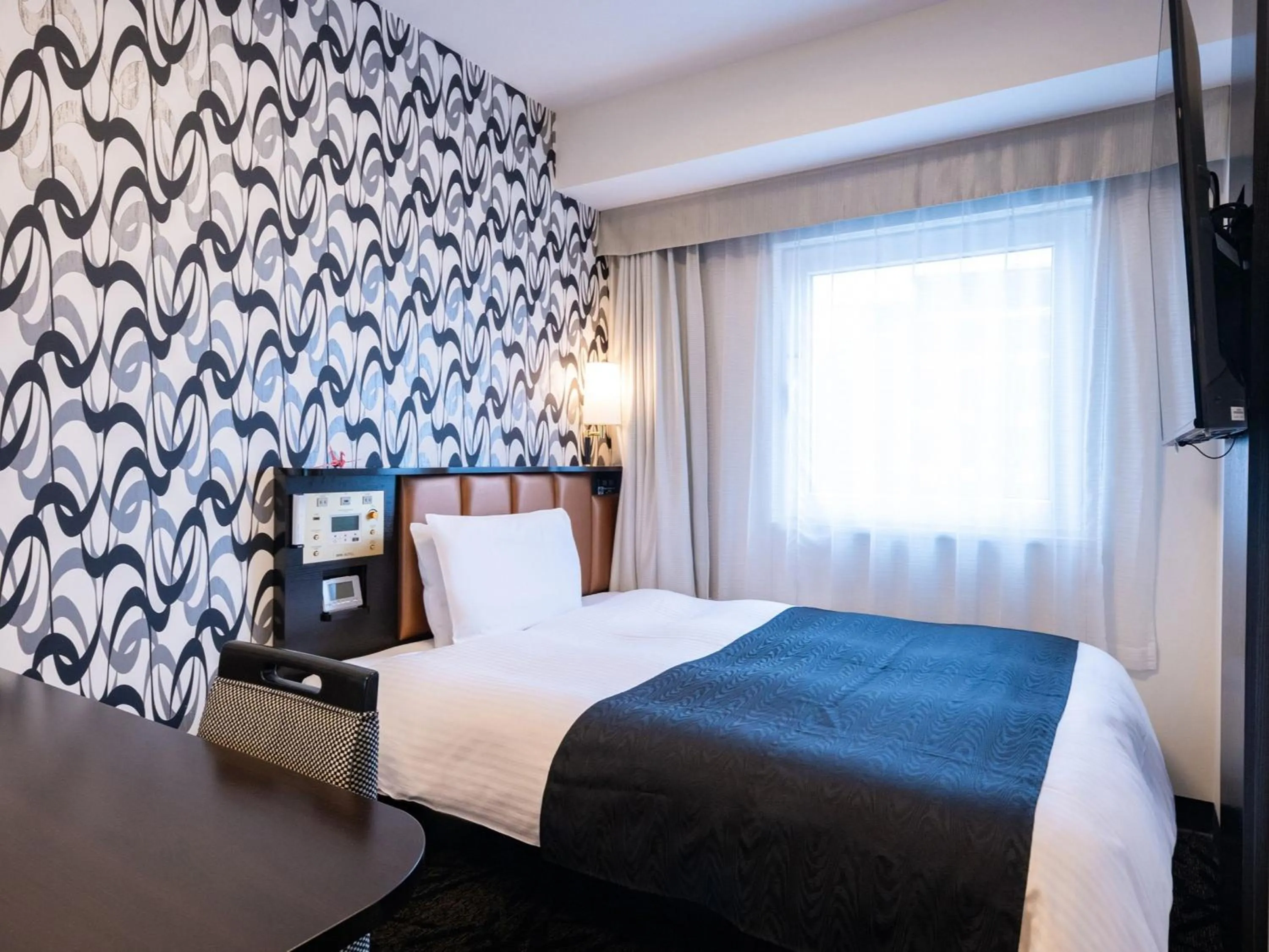 Photo of the whole room, Bed in APA Hotel Nagoya Ekimae