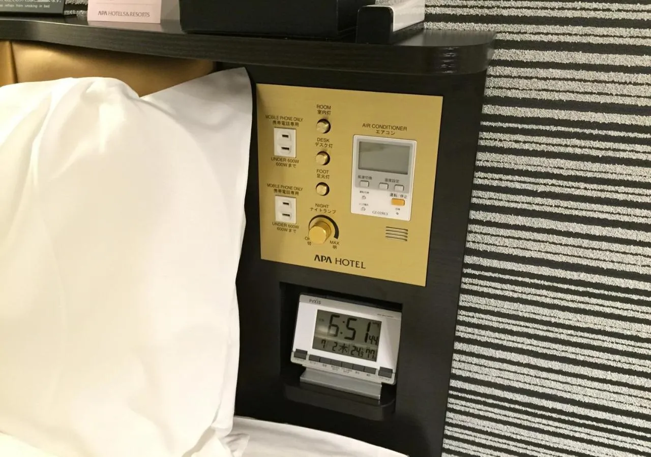 Photo of the whole room, Bed in APA Hotel Nagoya Ekimae