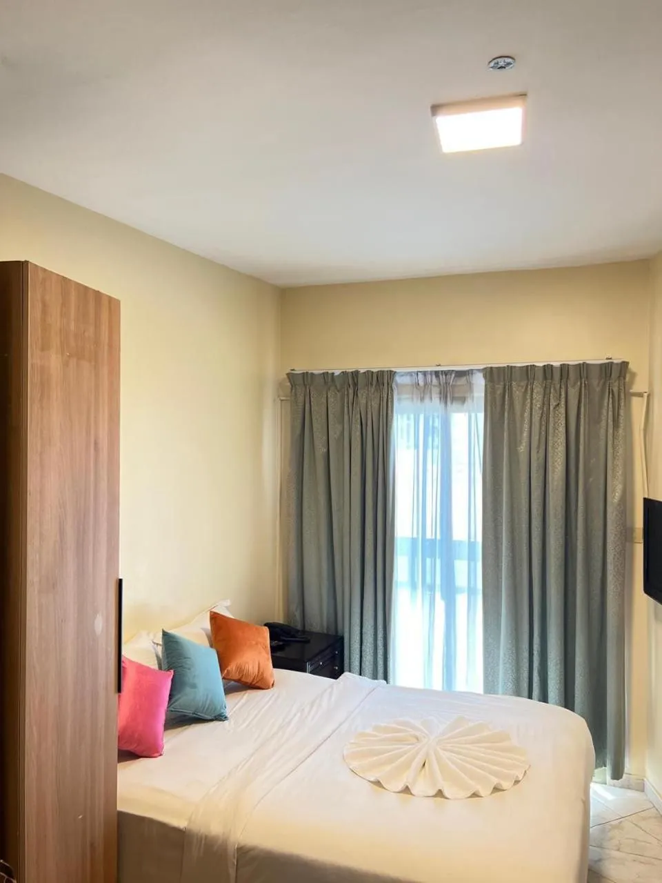 Bed in Safari Hotel Apartments