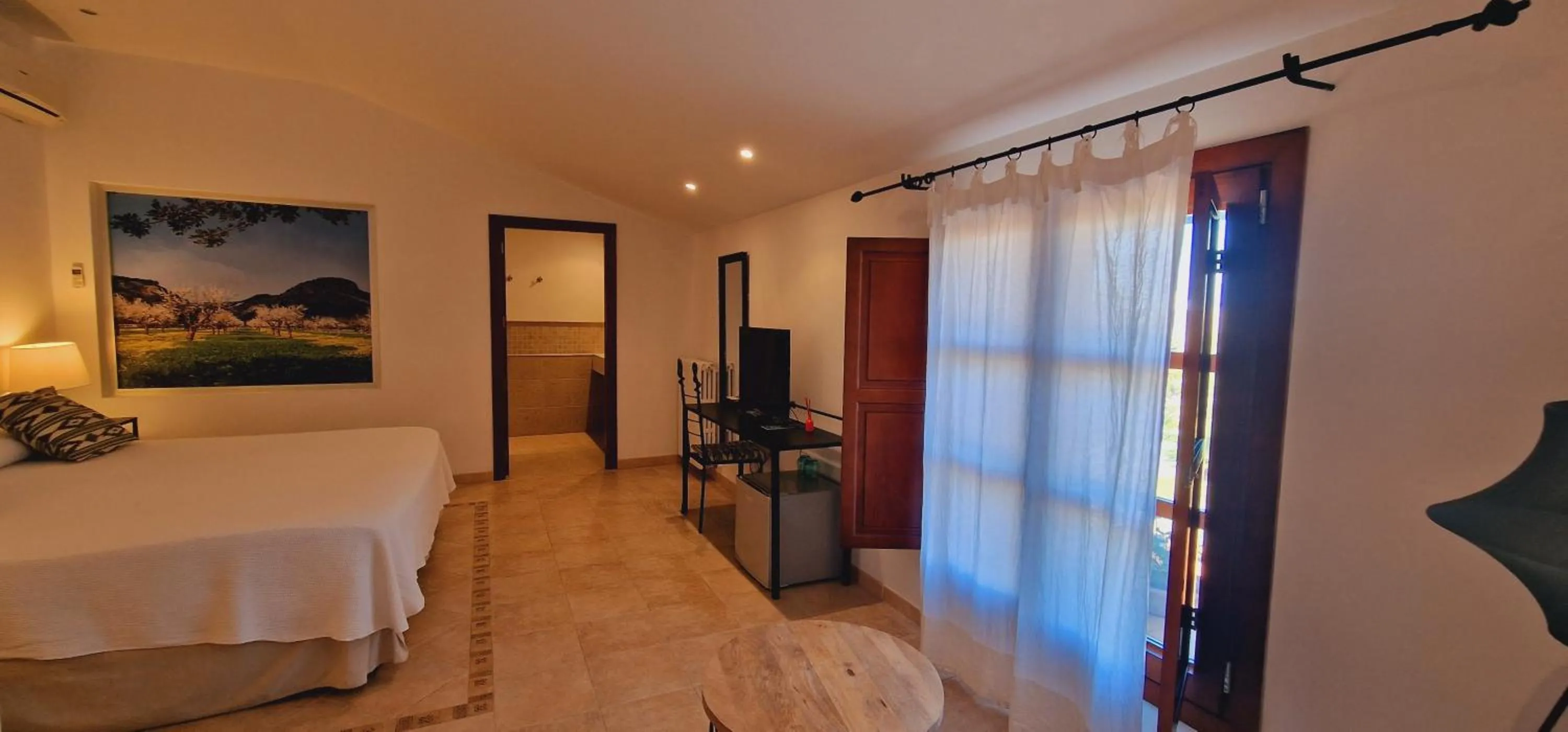 Bed in PETIT HOTEL ALGAIDA