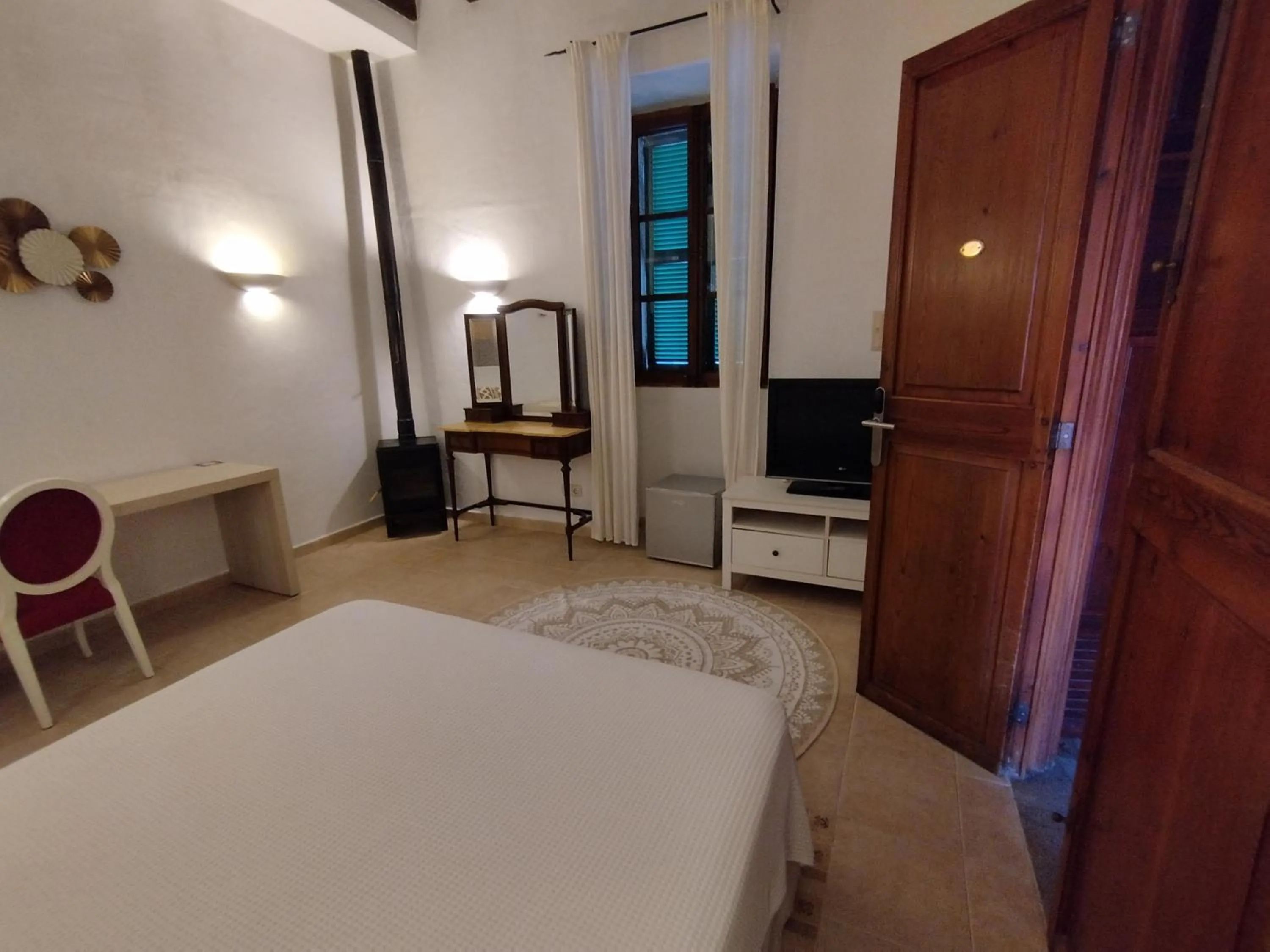 Bed in PETIT HOTEL ALGAIDA