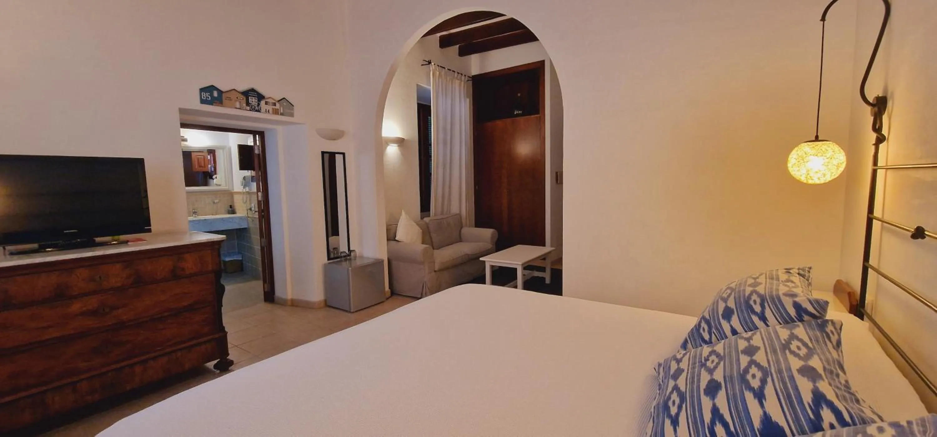 Bed in PETIT HOTEL ALGAIDA