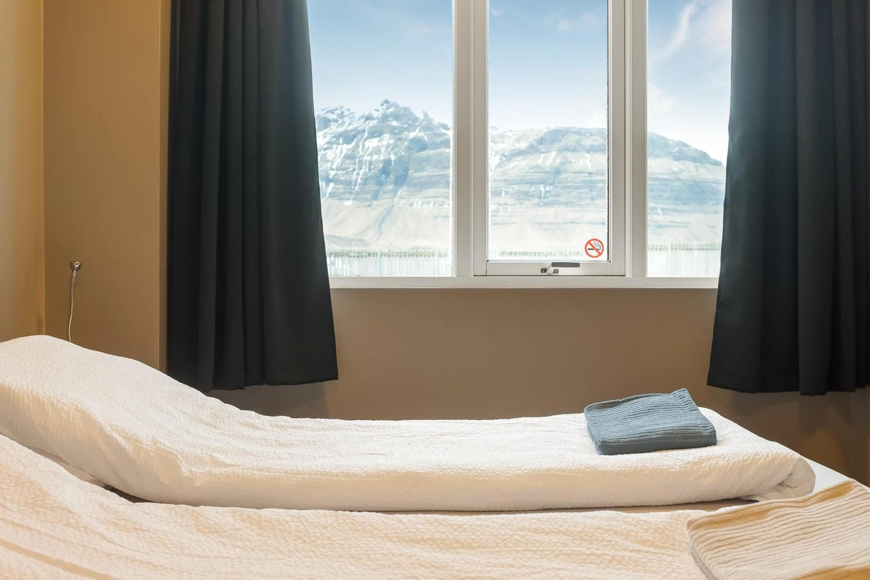 Bed in Stöð Guesthouse and apartments