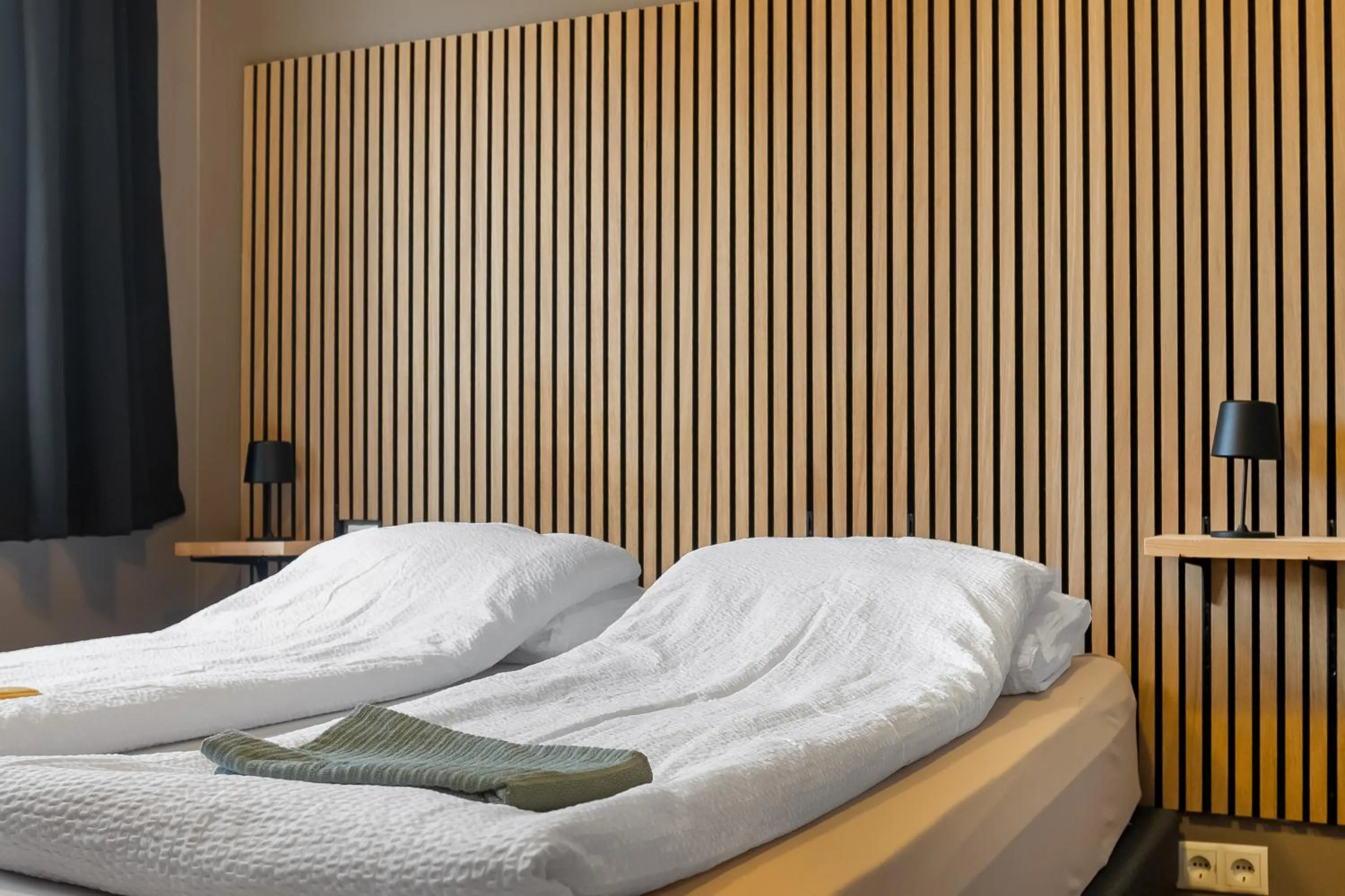 Bed in Stöð Guesthouse and apartments