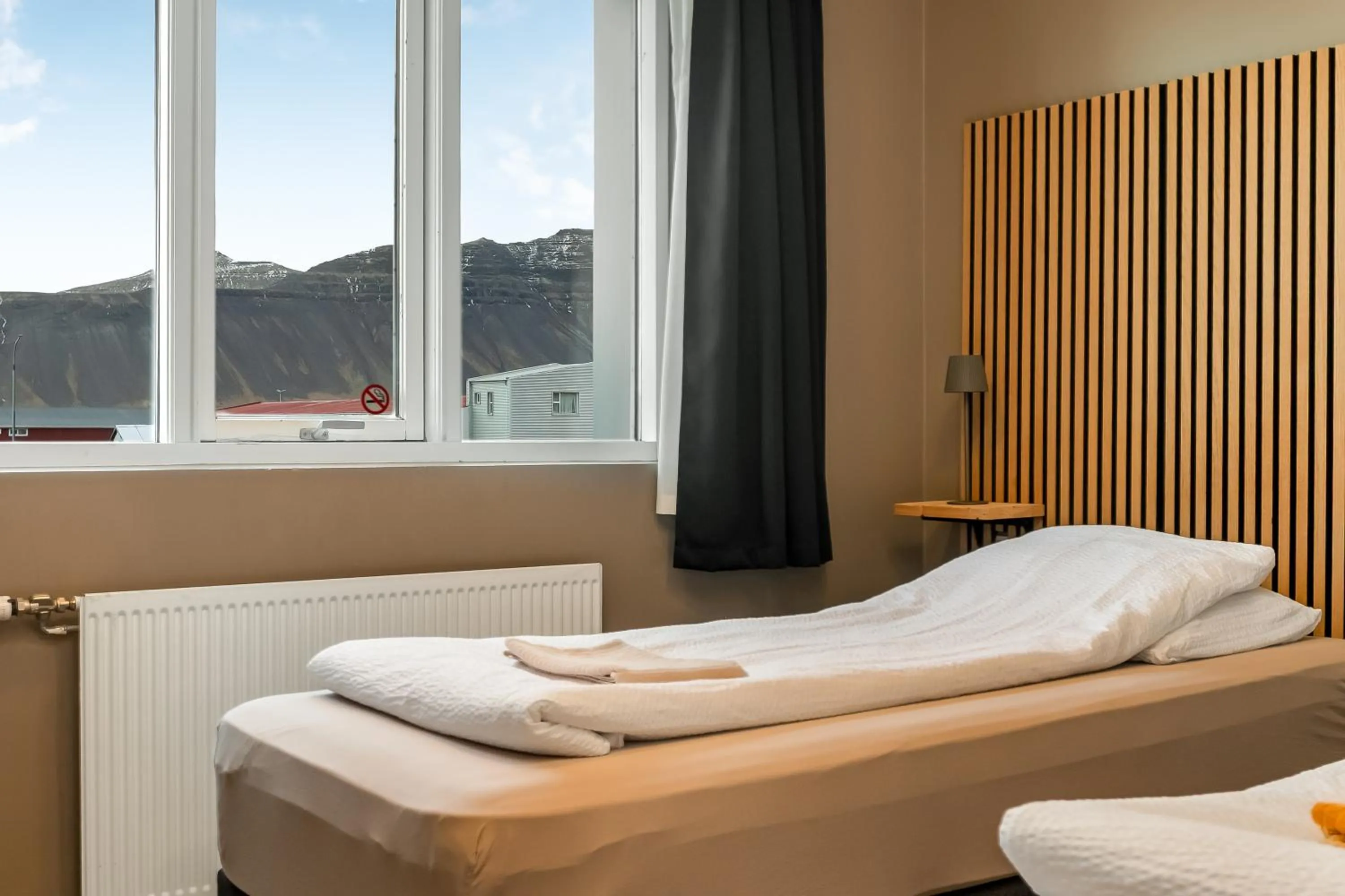 Bed in Stöð Guesthouse and apartments