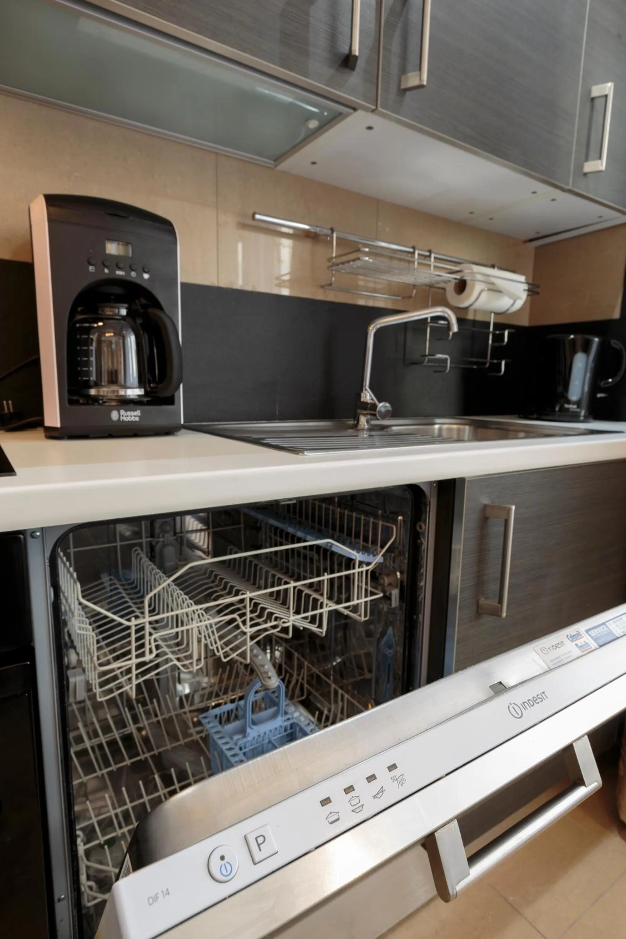 Kitchen or kitchenette in The Queen Luxury Apartments - Villa Giada