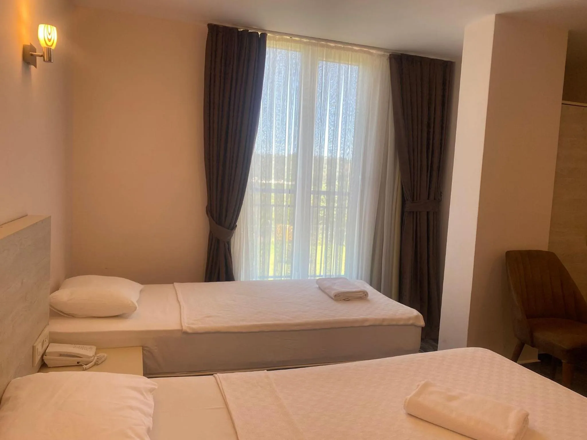 Bed in Dream Town Hotel&Restaurant