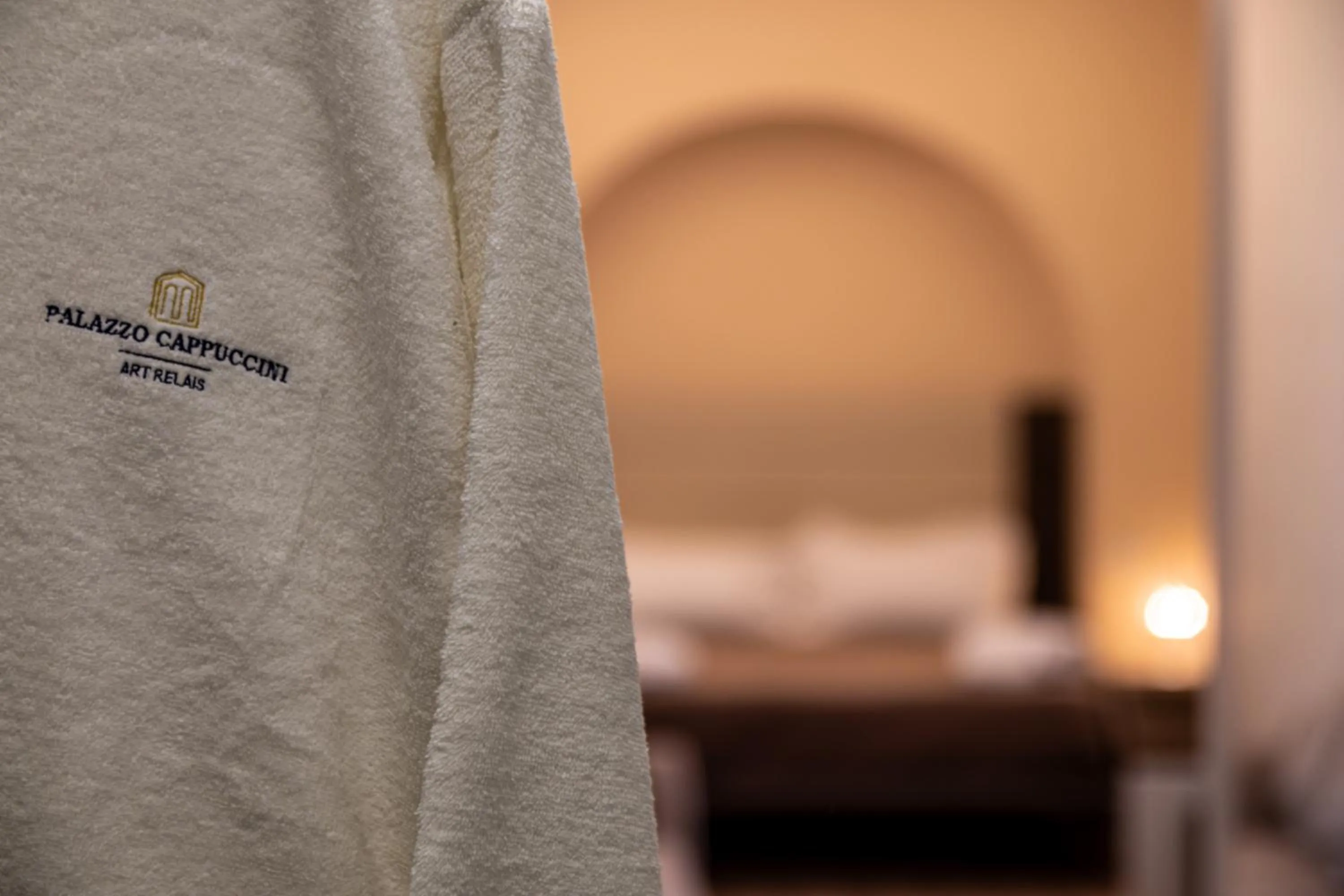 Bed in Palazzo Cappuccini Art Relais