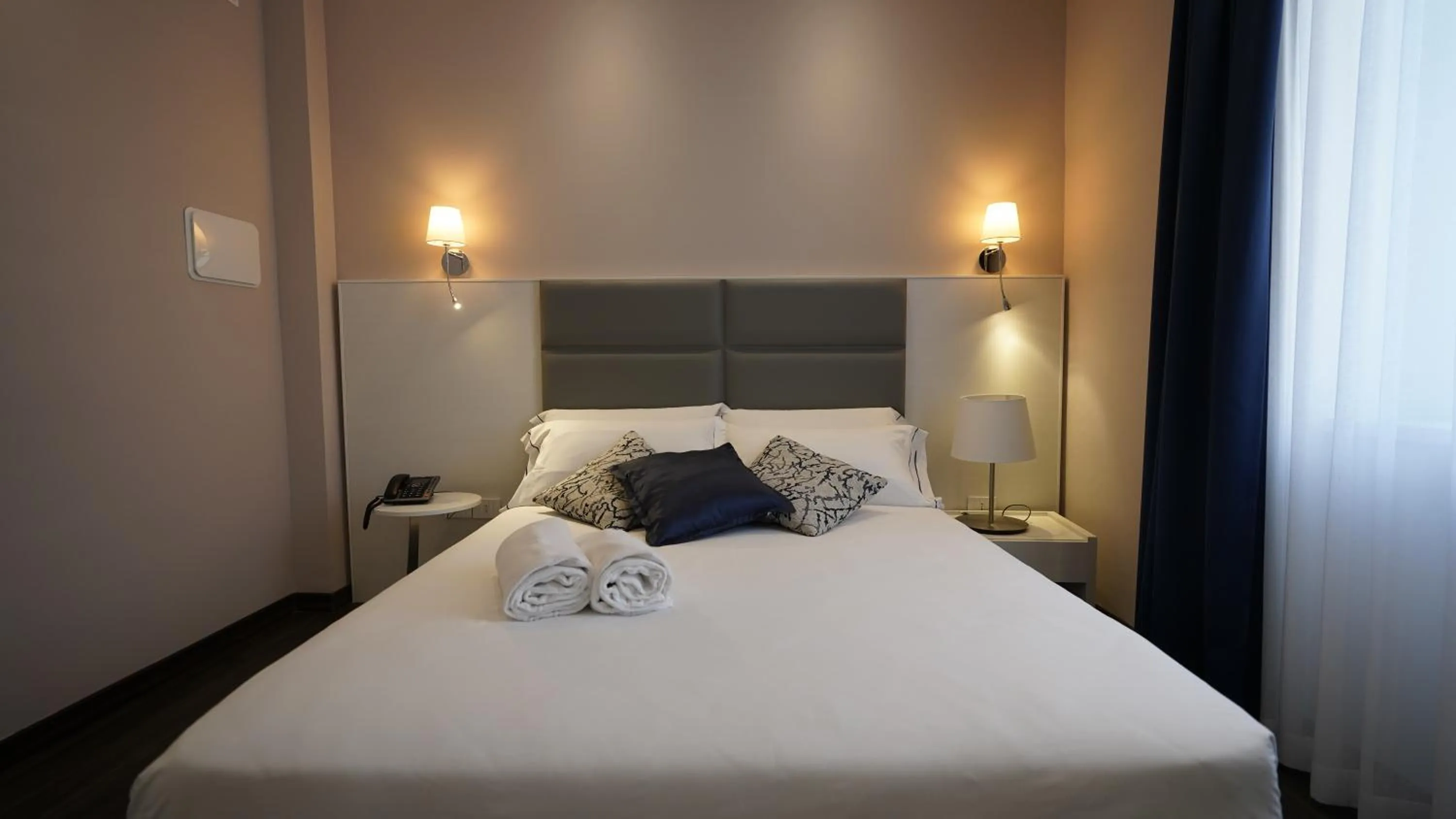 Bed in Palazzo Cappuccini Art Relais