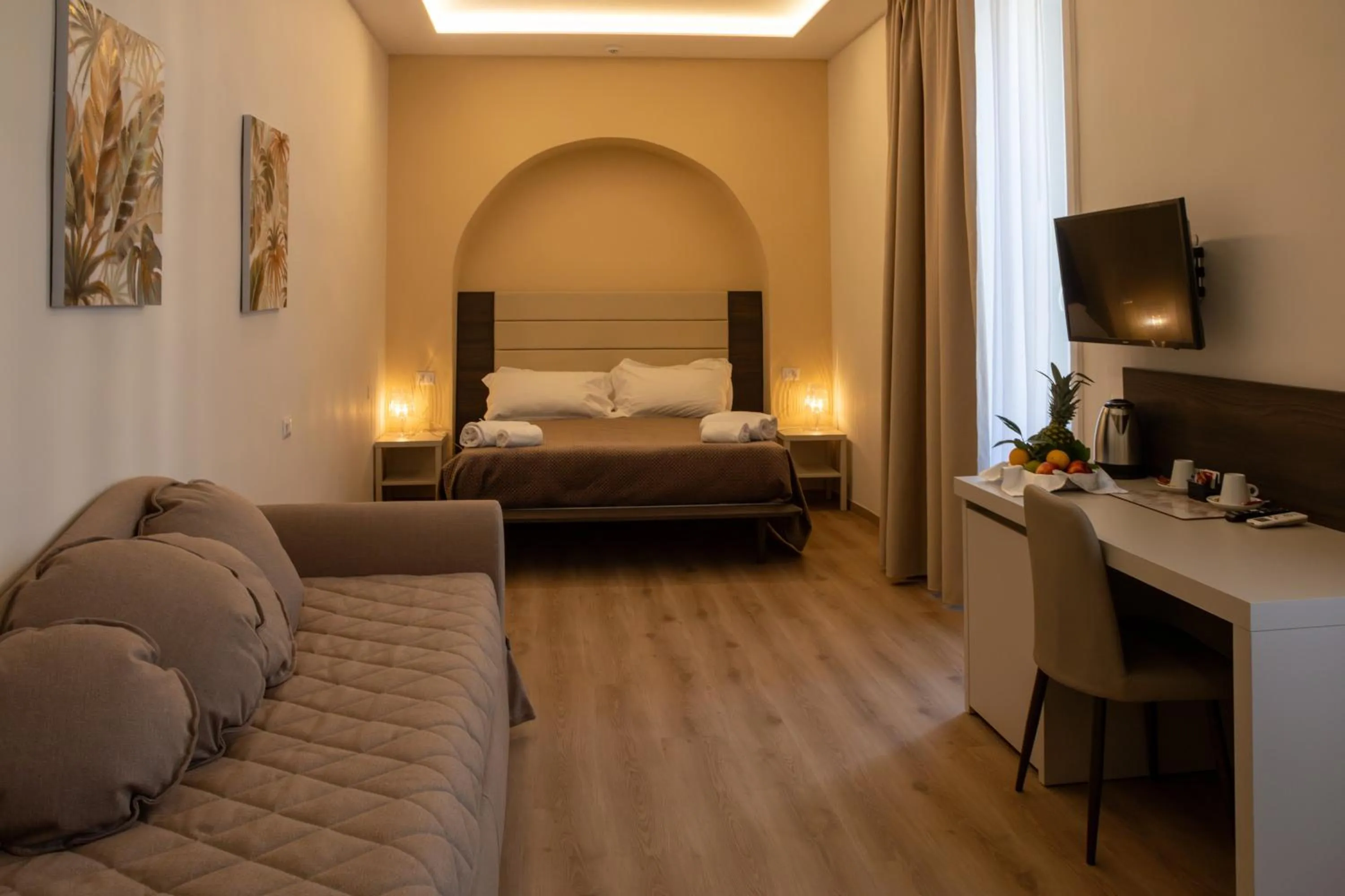 Bed in Palazzo Cappuccini Art Relais