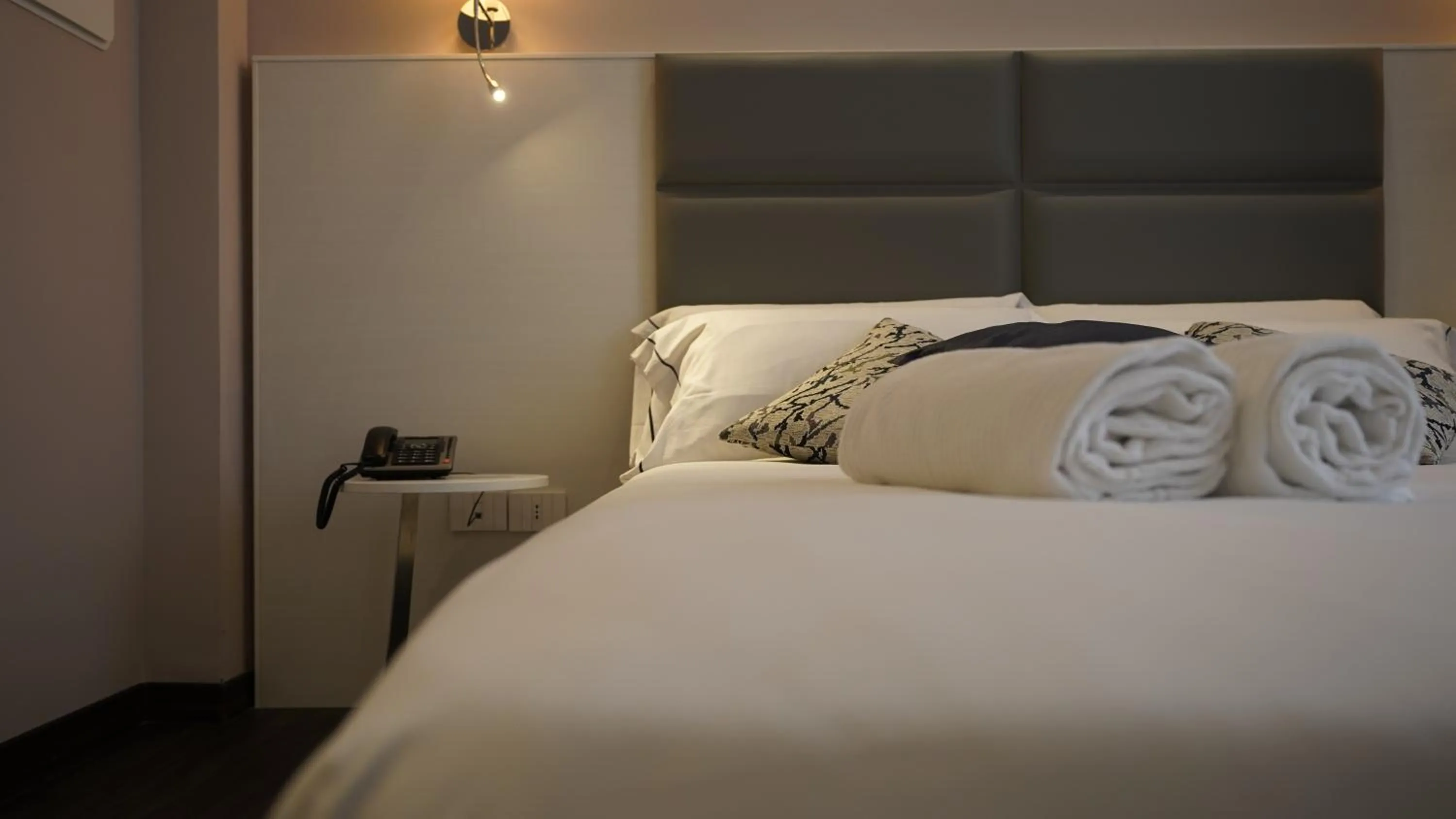 Bed in Palazzo Cappuccini Art Relais