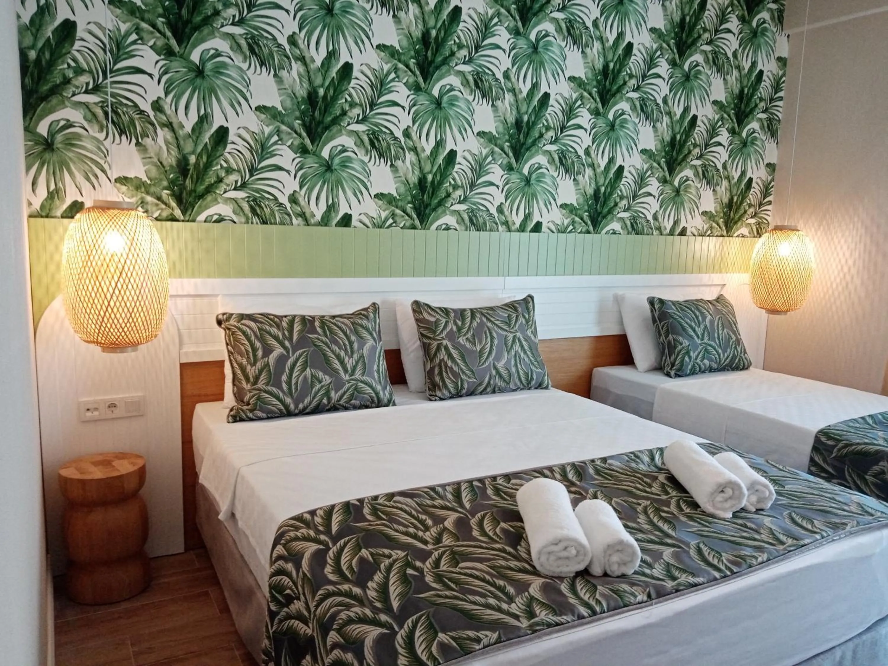 Bed in Dolphin Park Hotel