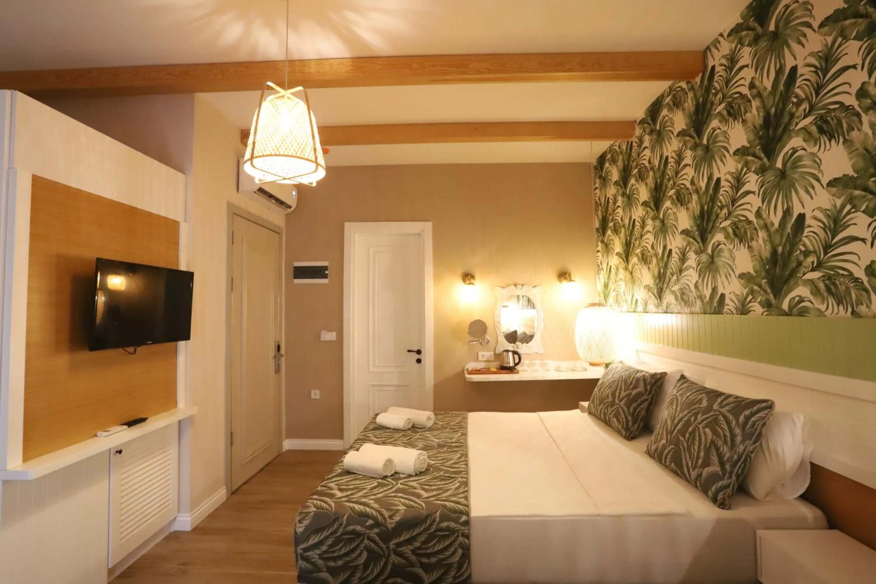 Bed in Dolphin Park Hotel