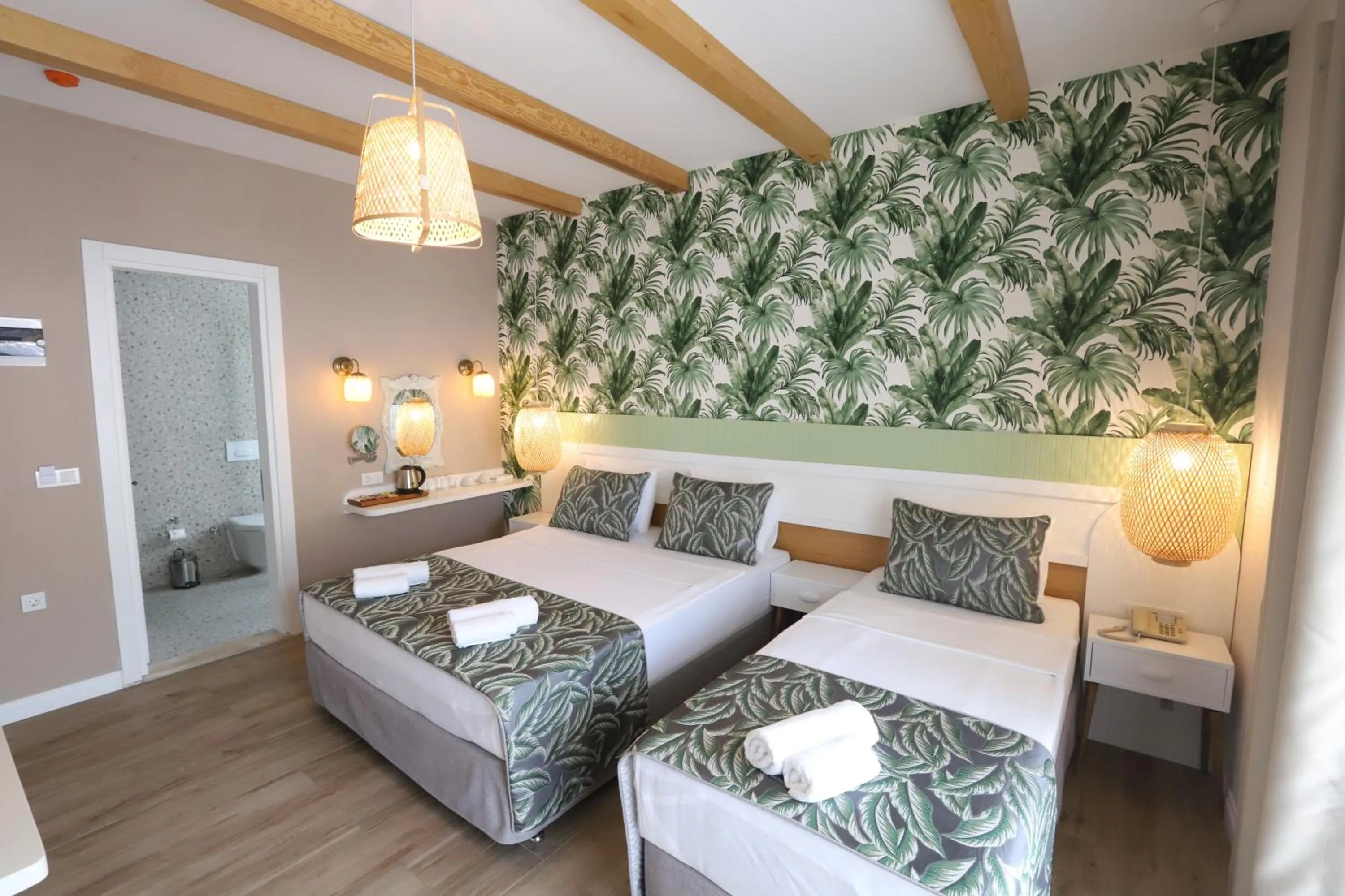 Bed in Dolphin Park Hotel