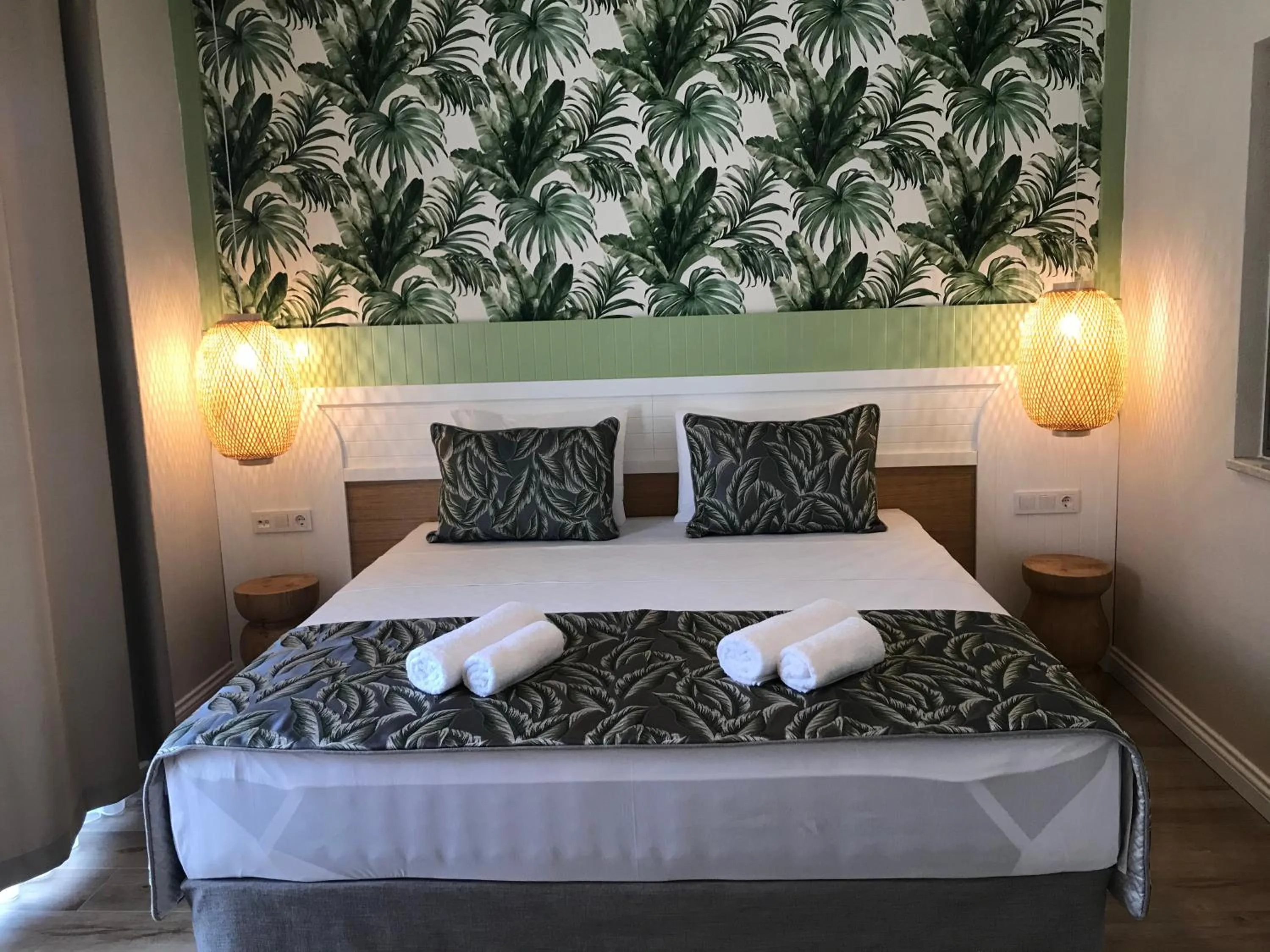 Bed in Dolphin Park Hotel