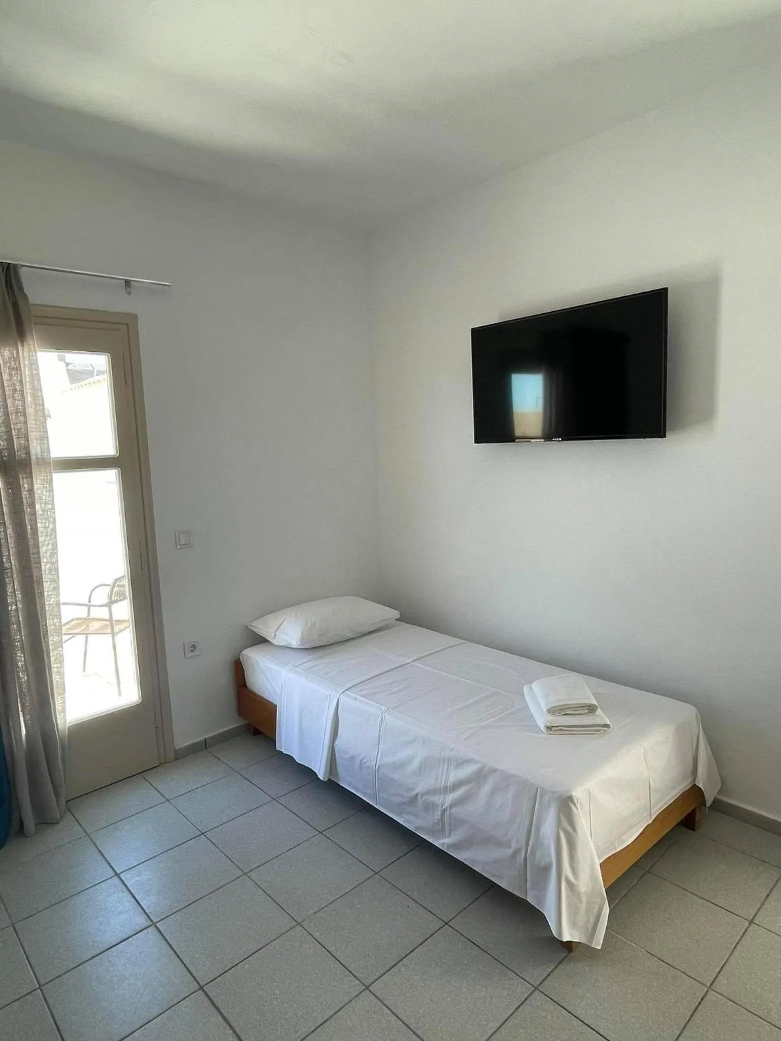 Bed in Coralli Beach Hotel