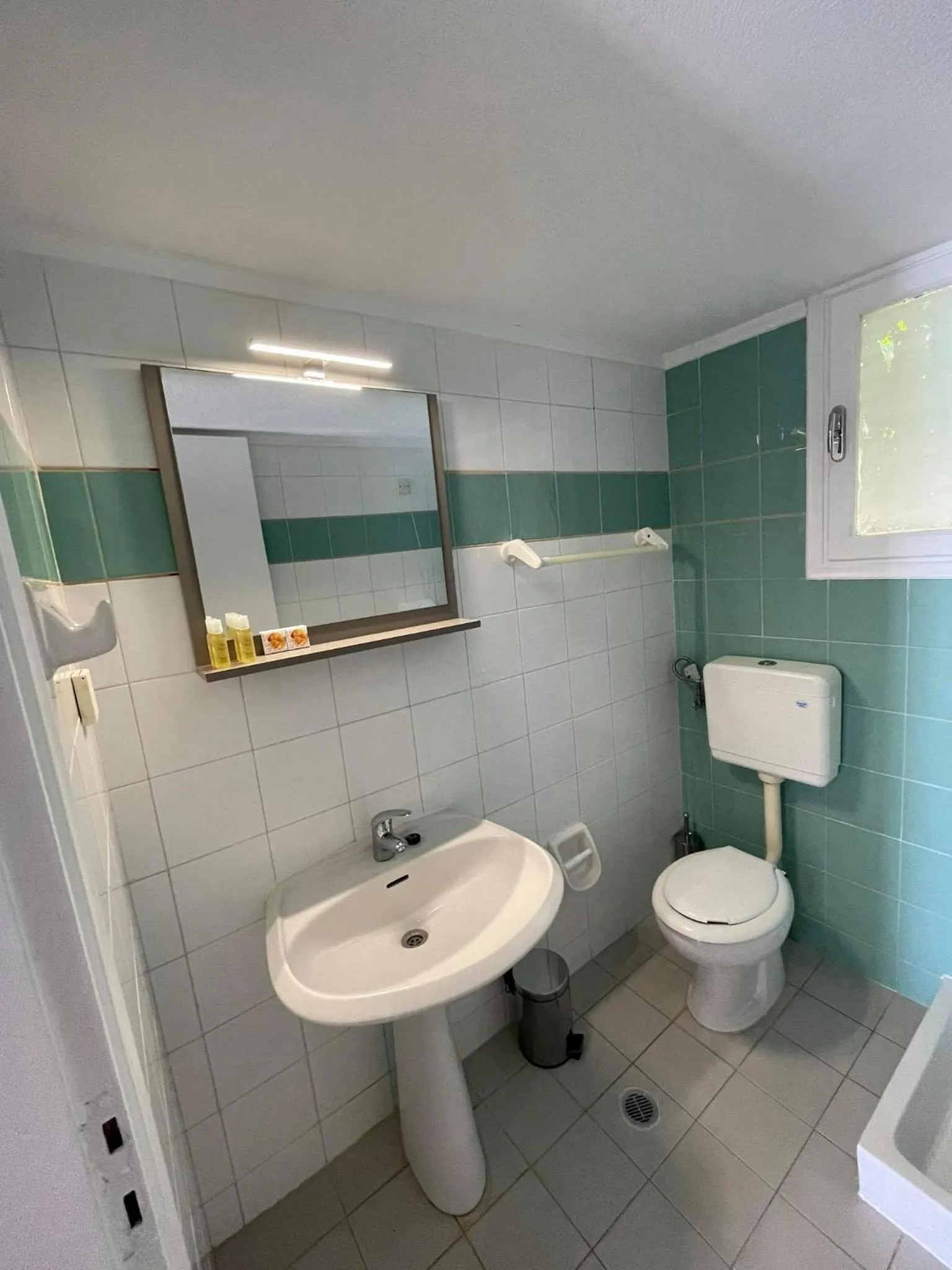 Toilet in Coralli Beach Hotel