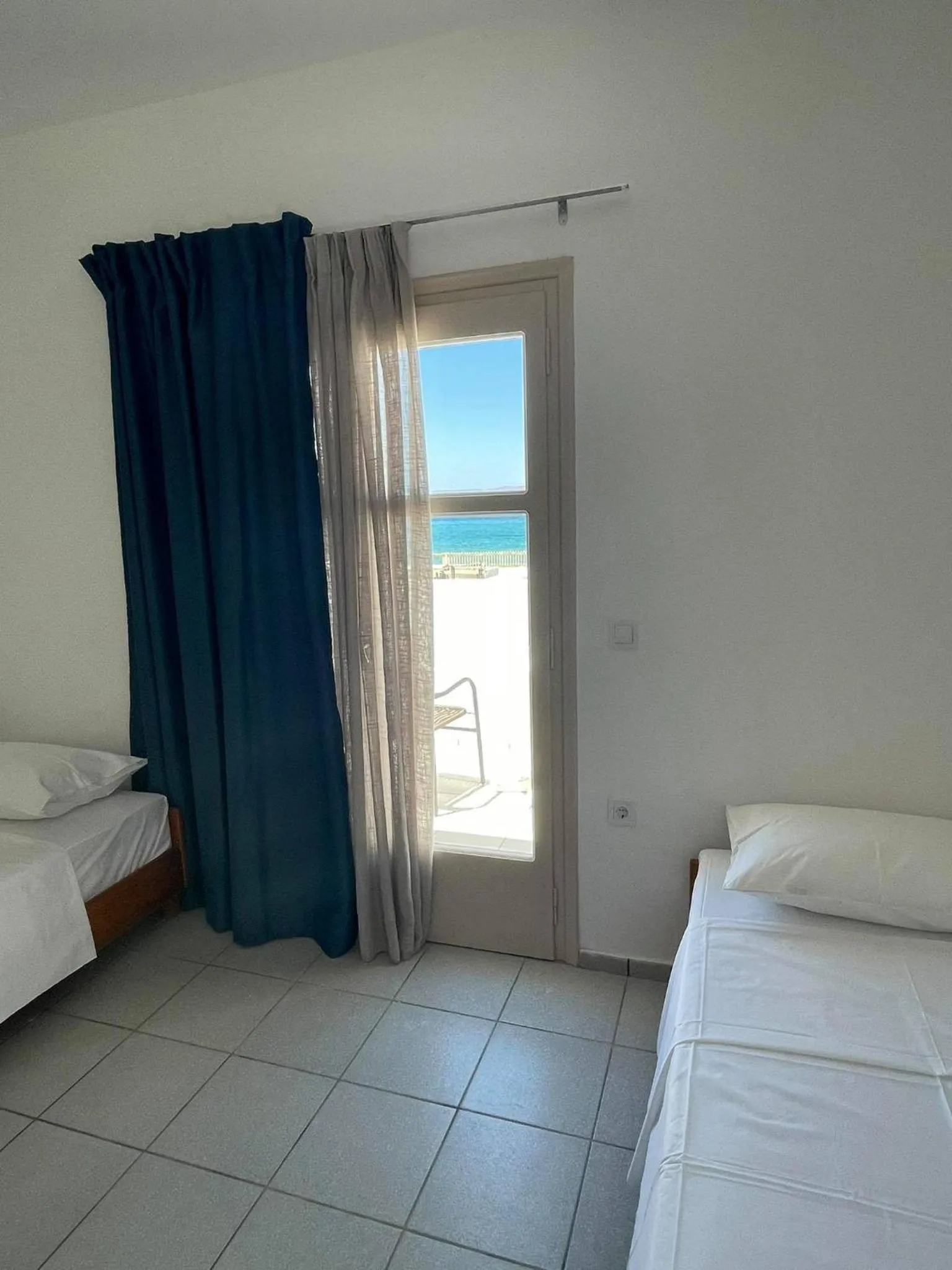 Bed in Coralli Beach Hotel