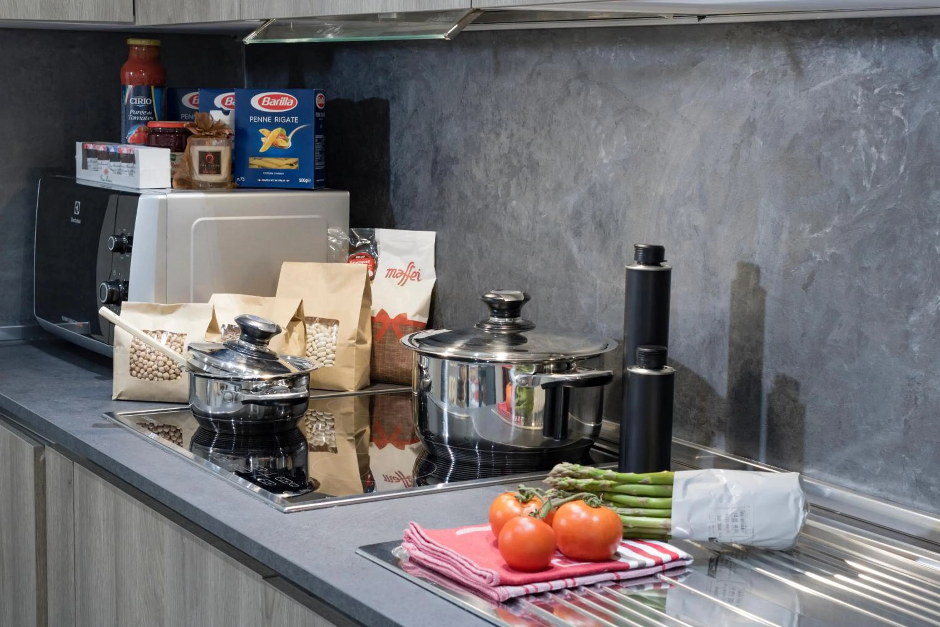 Kitchen or kitchenette in The Queen Luxury Apartments - Villa Liberty