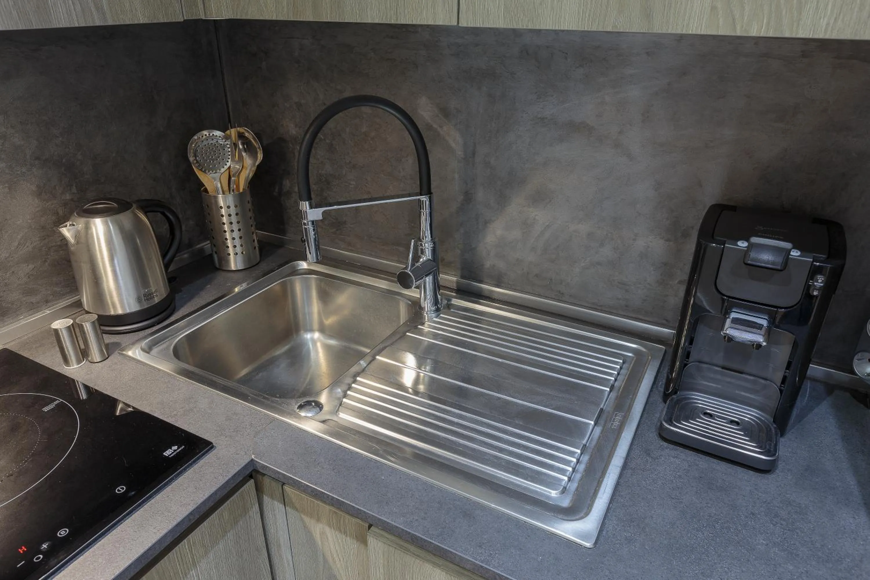 Kitchen or kitchenette in The Queen Luxury Apartments - Villa Liberty