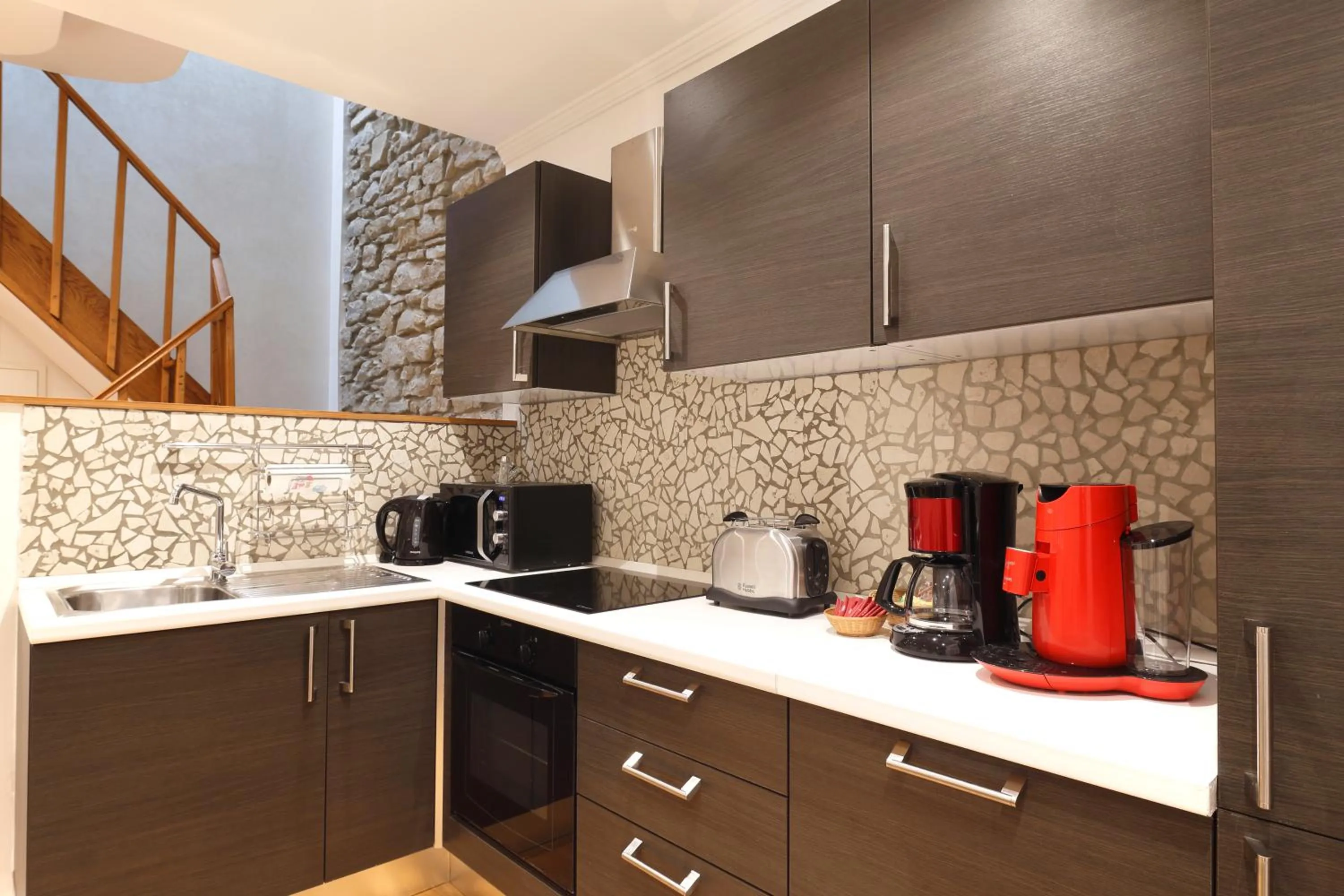 Kitchen or kitchenette in The Queen Luxury Apartments - Villa Liberty