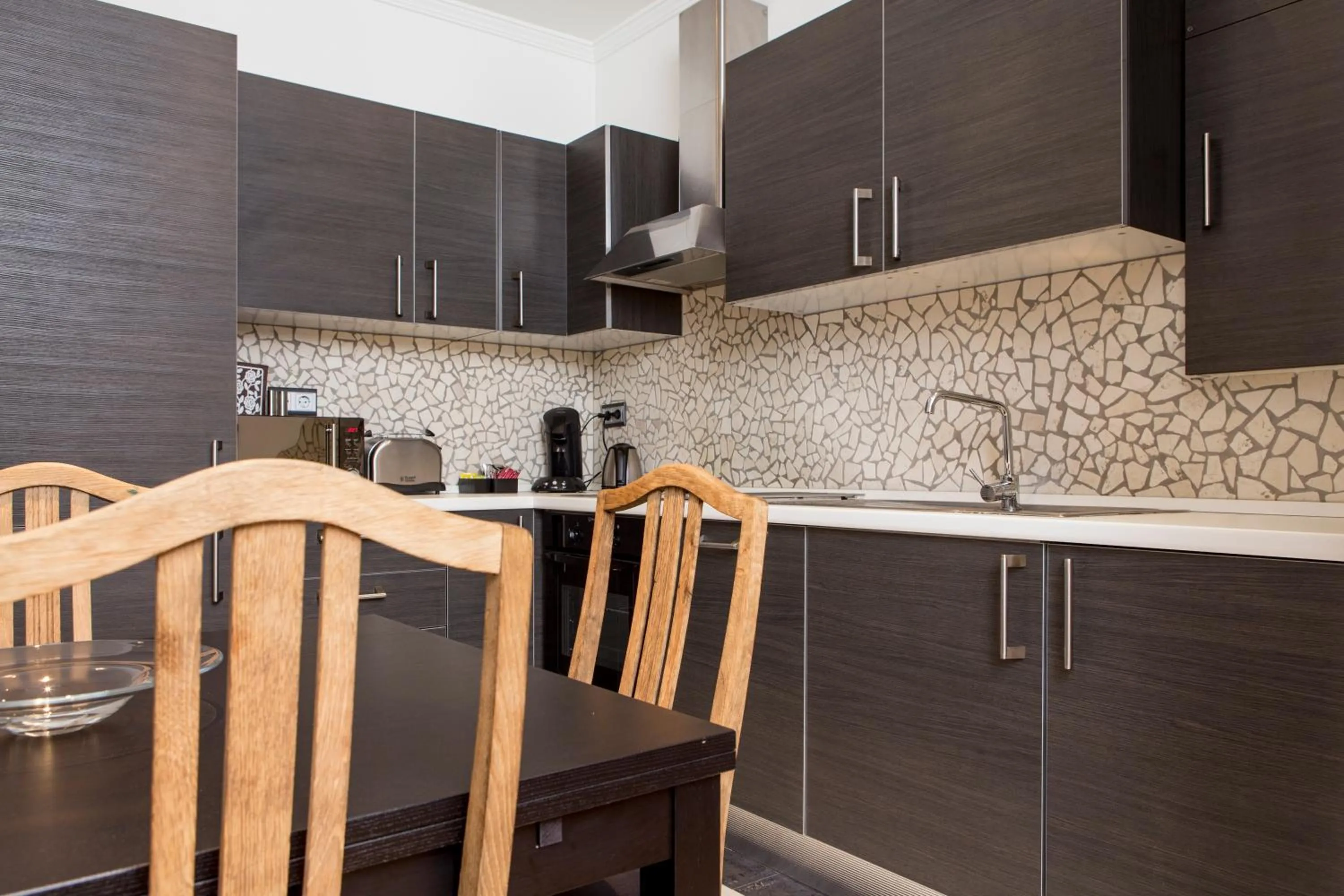 Kitchen or kitchenette in The Queen Luxury Apartments - Villa Liberty
